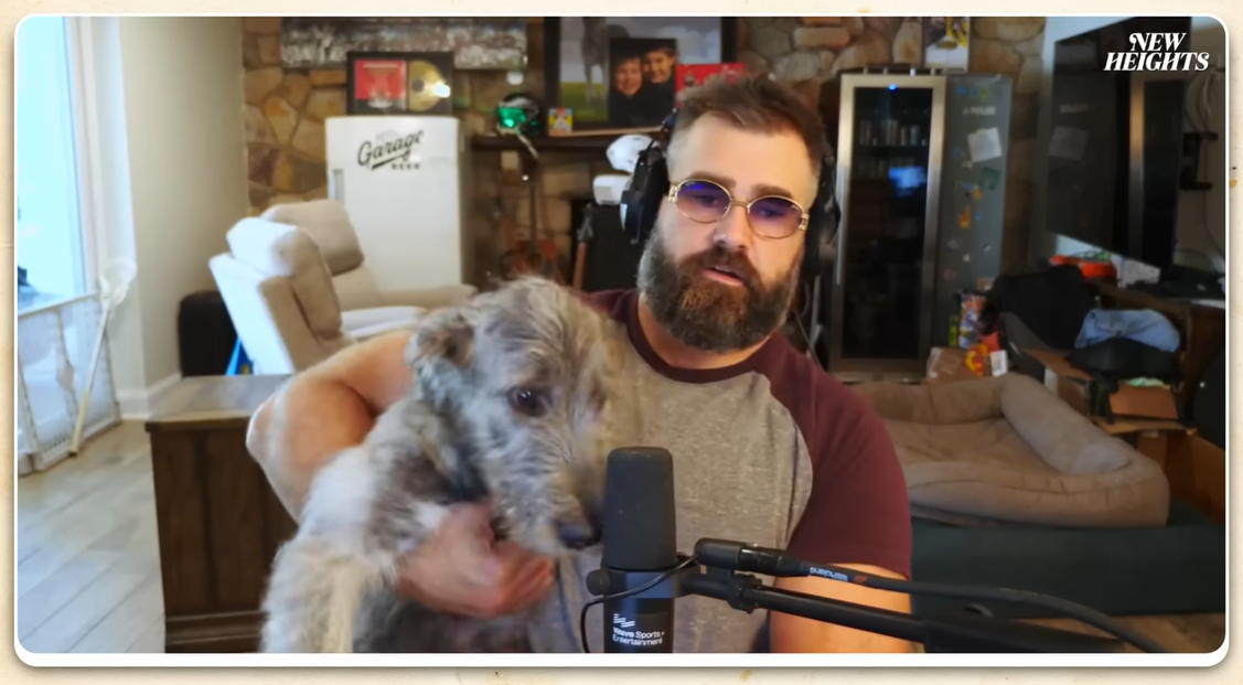 Jason Kelce introduces his new pup, Nessie, during the "New Heights" podcast in September 2024. | Source: YouTube/newheightshow