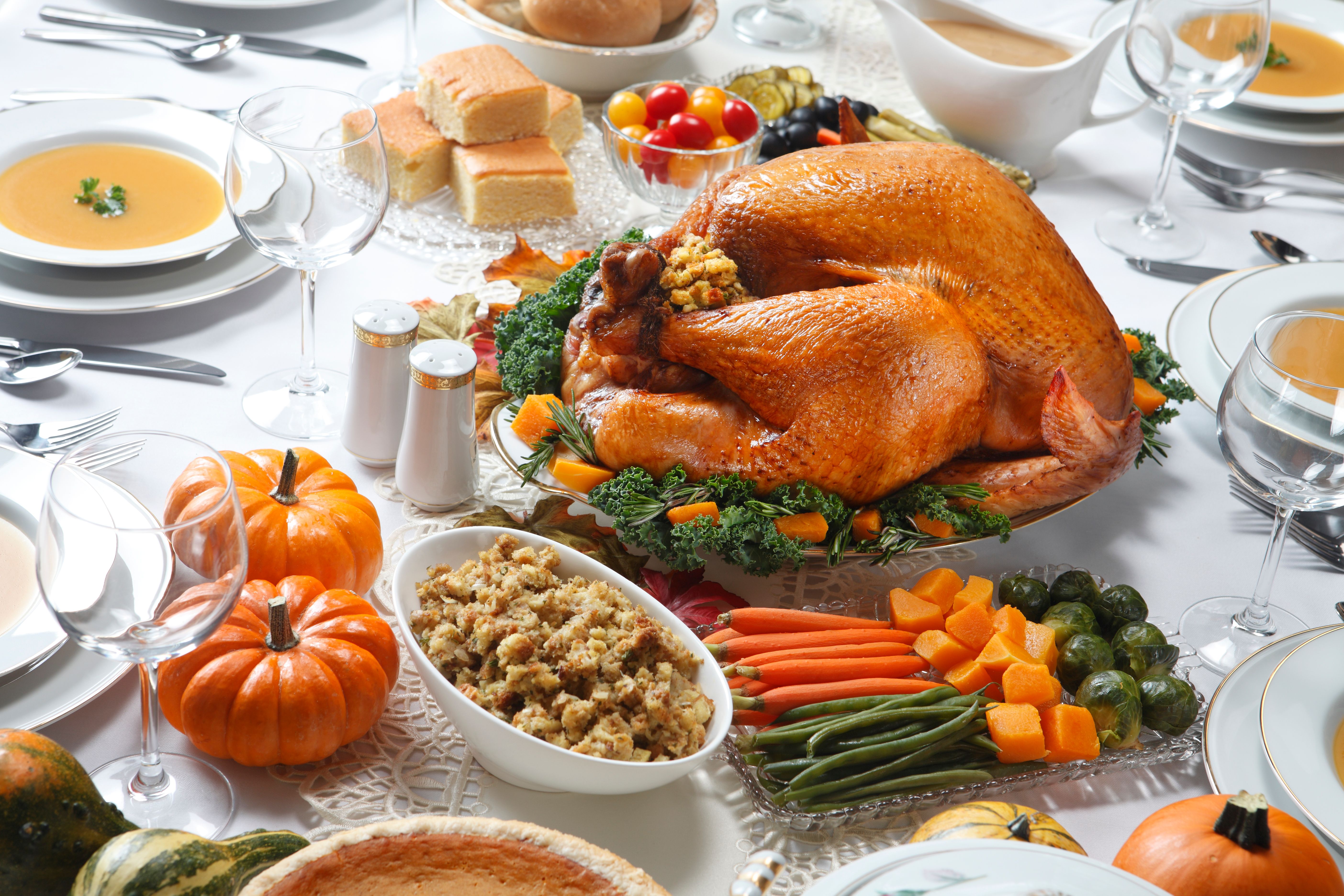 Turkey and other dishes on a table. | Source: Getty Images