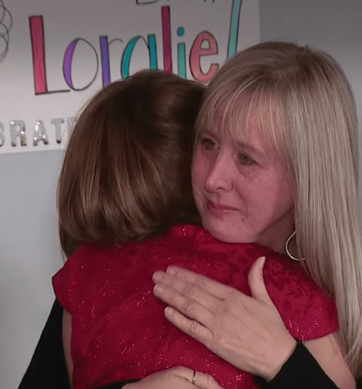 An emotional hug as a young student officially becomes her teacher's daughter  | Photo: Facebook/ABC7 