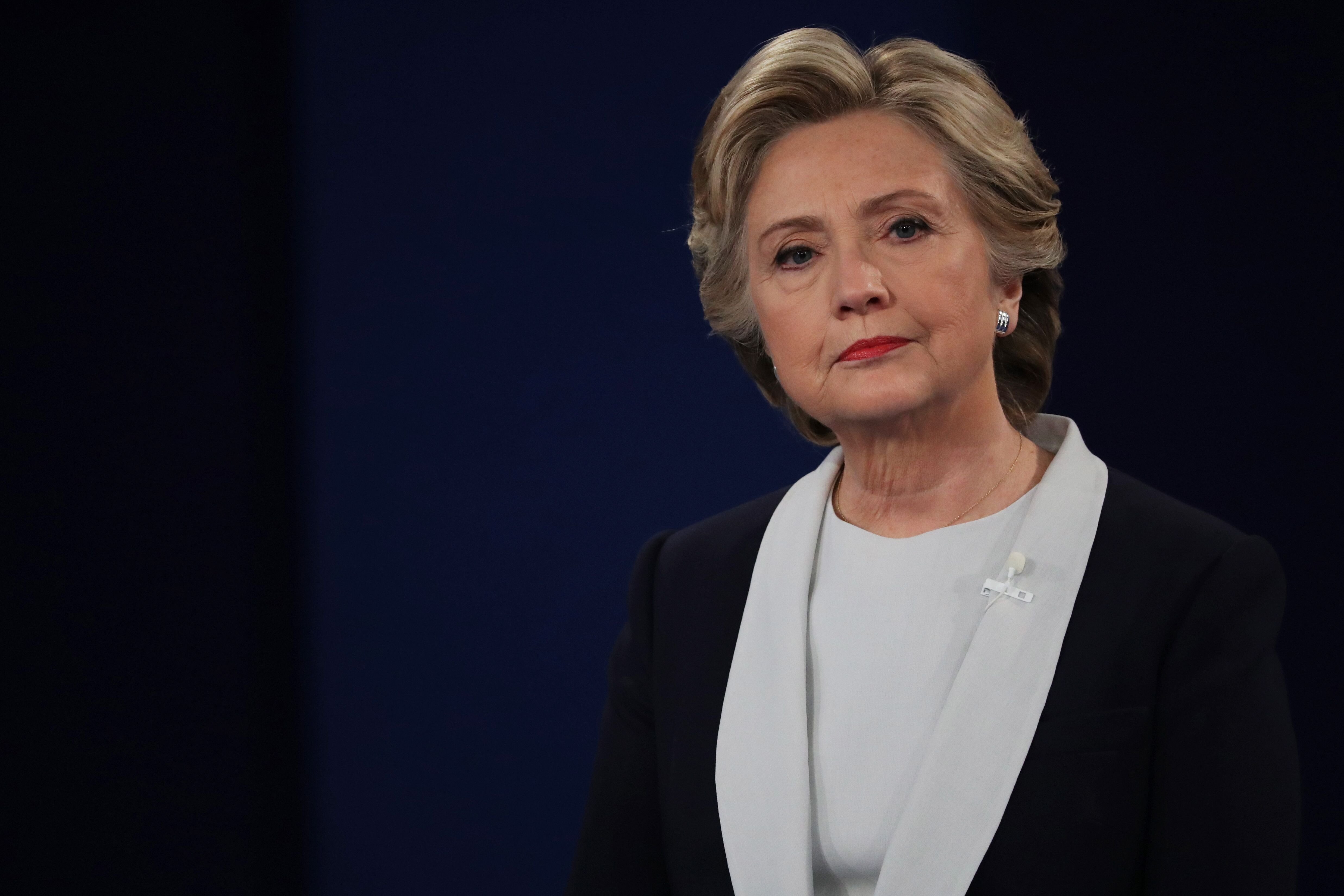 Hillary Clinton listens to a question during the town hall debate at Washington University in St Louis, Missouri | Photo: Getty Images