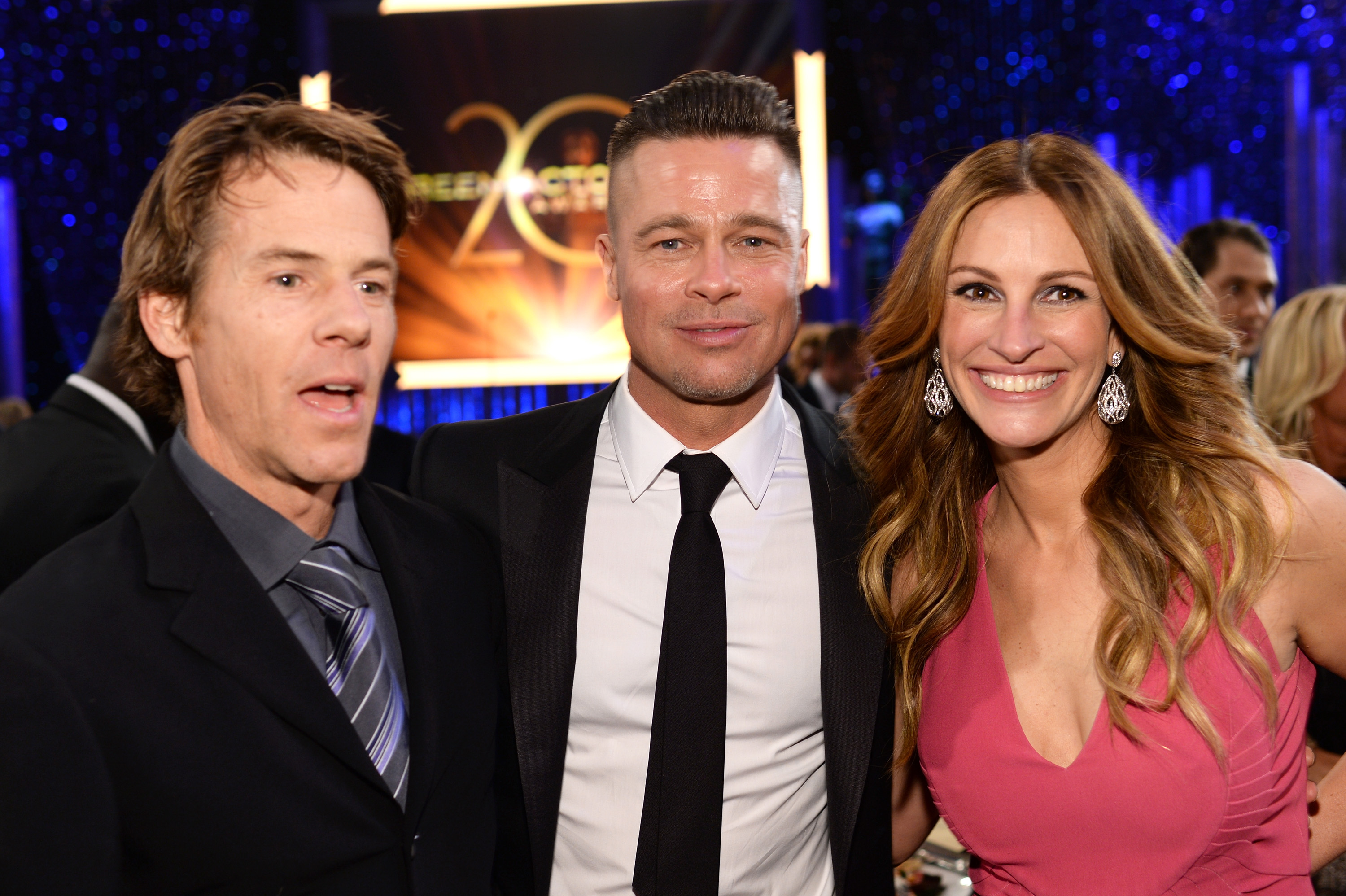 Danny Moder, Brad Pitt, and Julia Roberts attend the 20th Annual Screen Actors Guild Awards on January 18, 2014 | Source: Getty Images