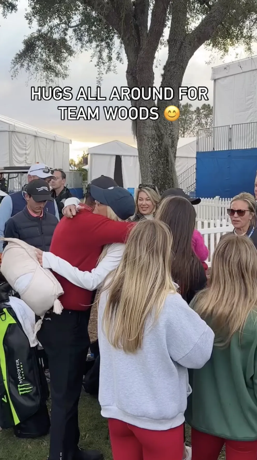 Tiger Woods, dressed in red, shares a warm hug with ex-wife Elin Nordegren in white after the final round of the PNC Championship on December 22, 2024 — a rare public show of unity. | Source: Instagram/golfoncbs