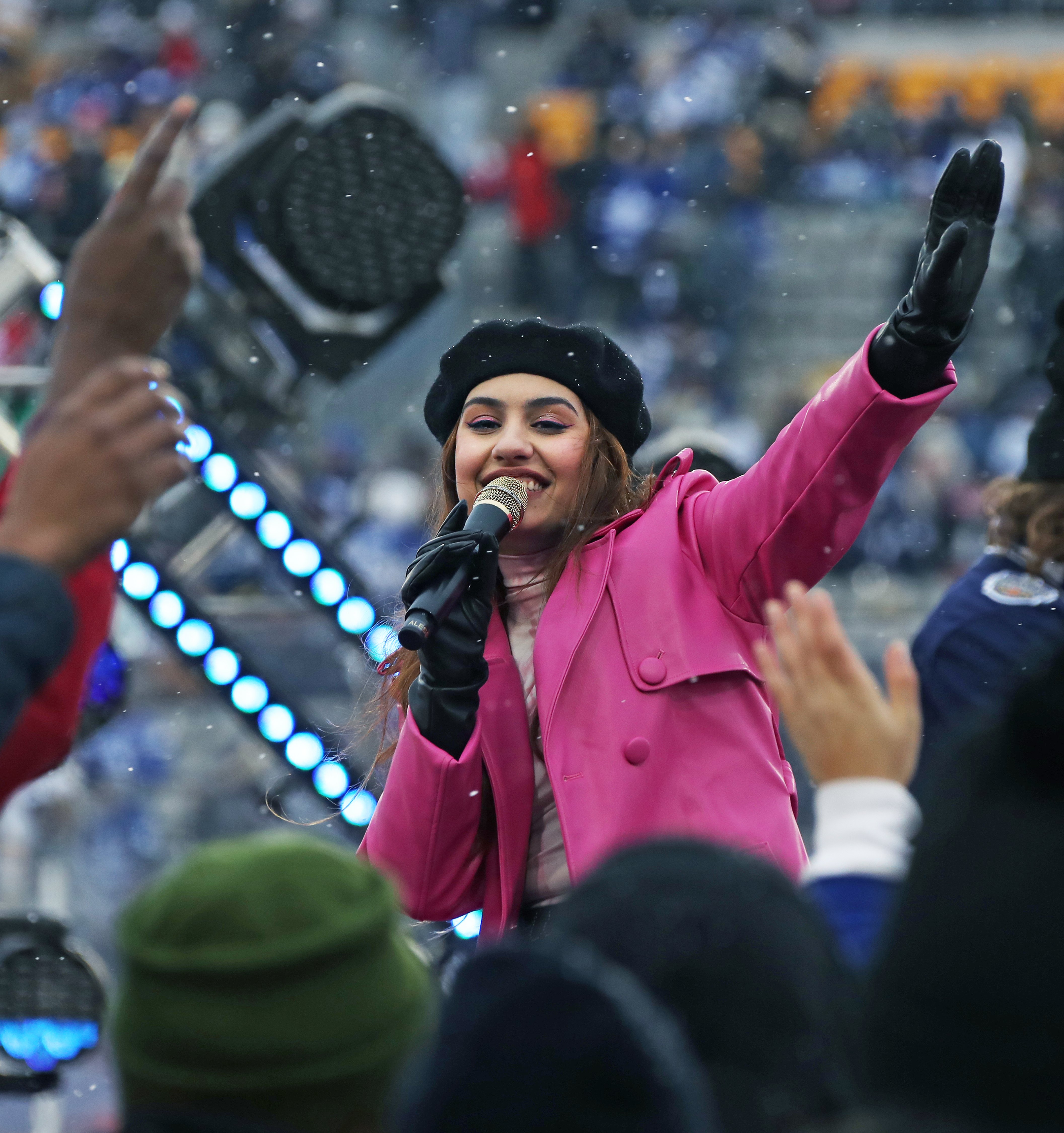 Alessia Cara during the 1st period intermission of the game between the Toronto Maple Leafs and the Buffalo Sabres in 2022, in Hamilton, Ontario, Canada. | Source: Getty Images