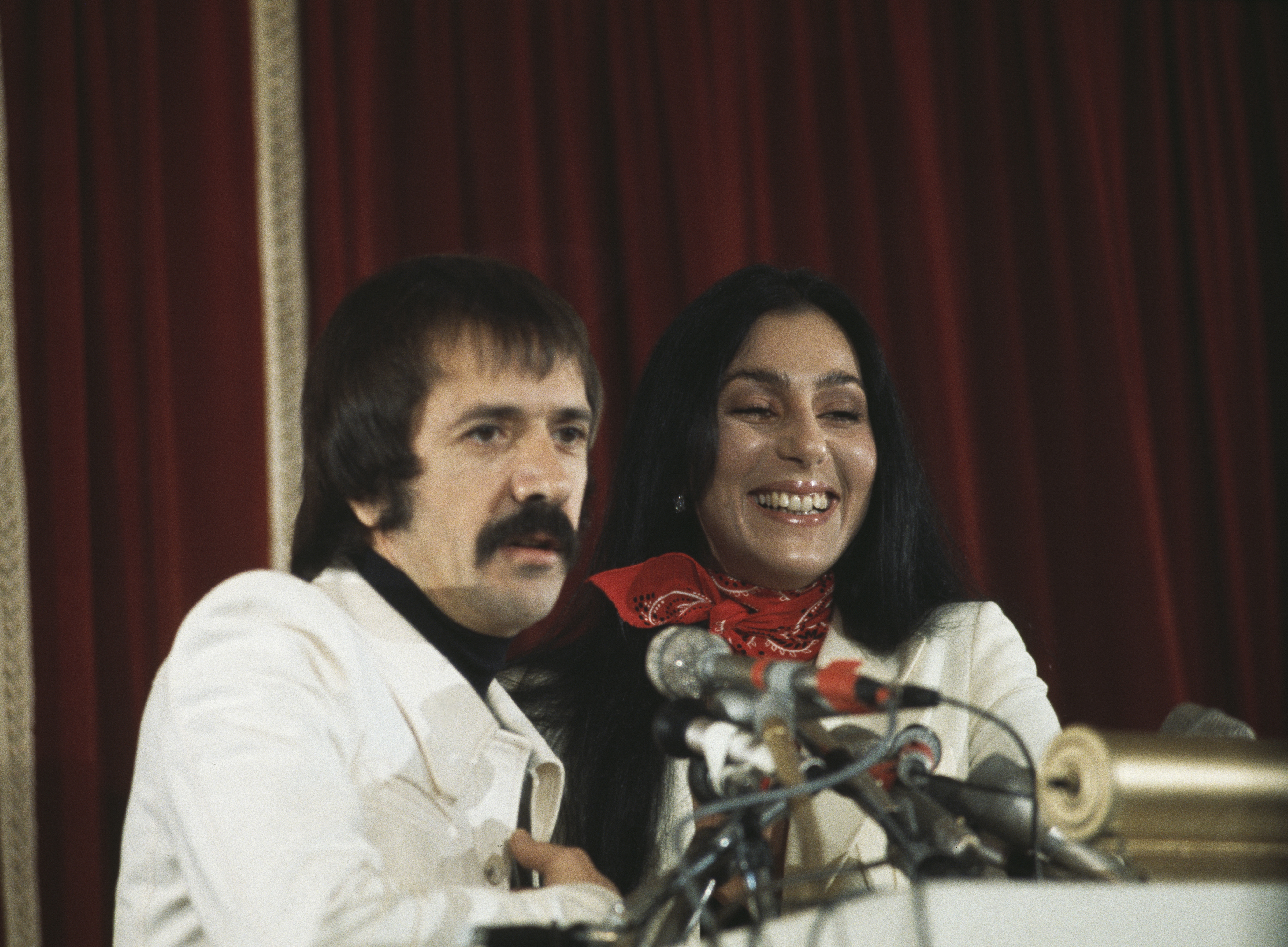 Sonny Bono and Cher holding a press conference on December 4, 1975  in Hollywood, California | Source: Getty Images