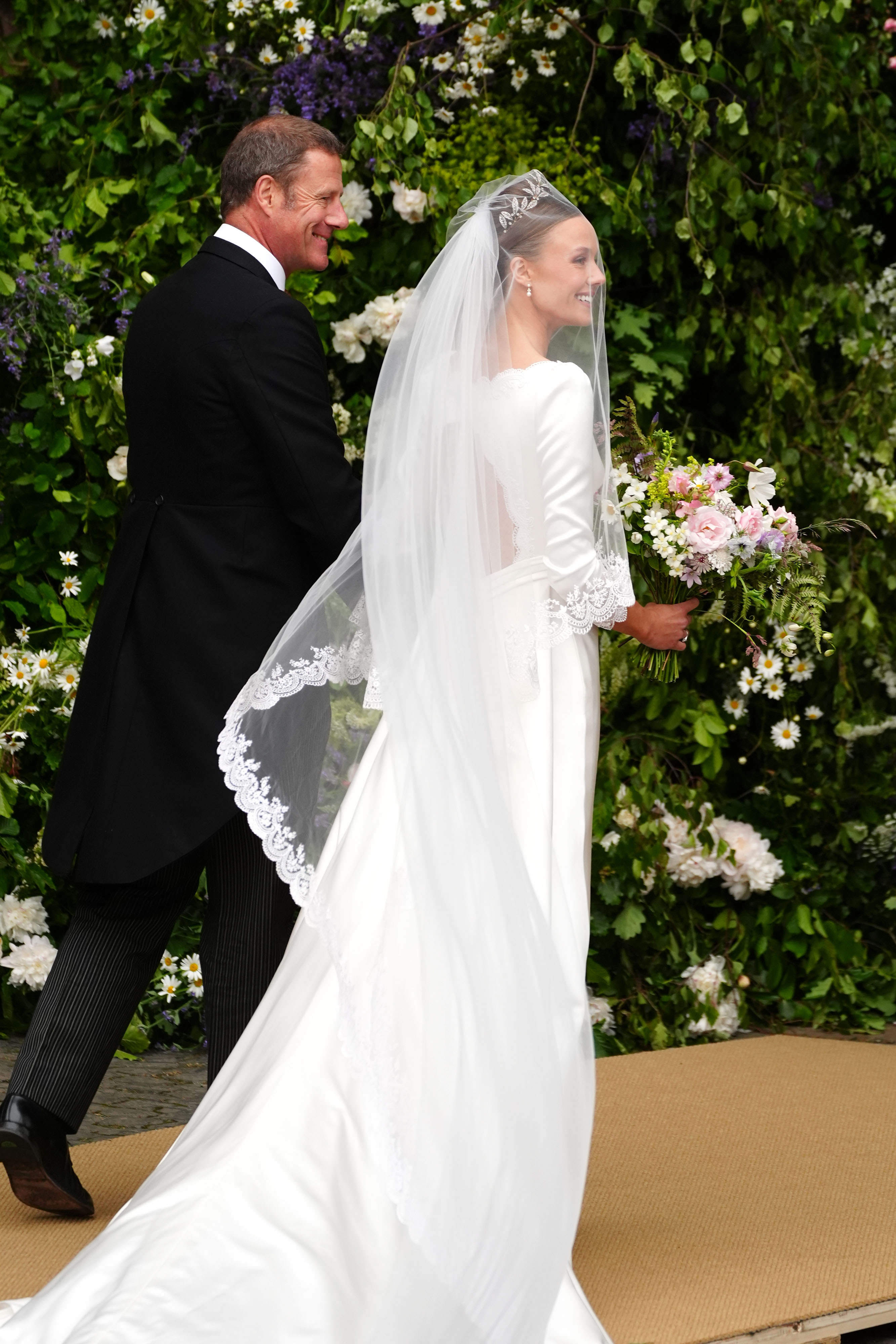 Olivia Henson arrives for her wedding to Hugh Grosvenor, the Duke of Westminster, where her father, Rupert, walked her down the aisle at Chester Cathedral on June 7, 2024 | Source: Getty Images