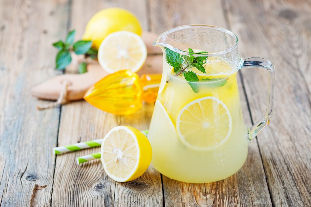 Lemons and lemonade in a pitcher. | Source: Shutterstock