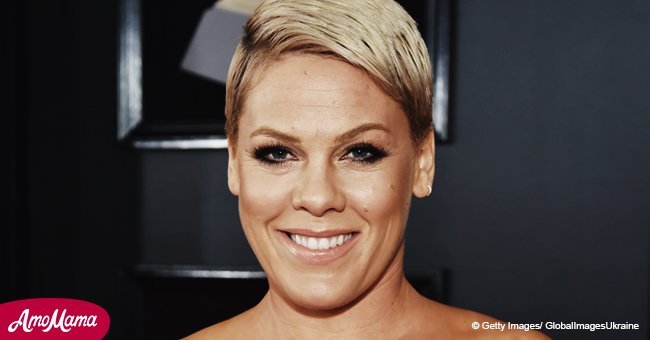Pink, 38, looks impressive in a sports luxe look as she enjoys theater date with husband