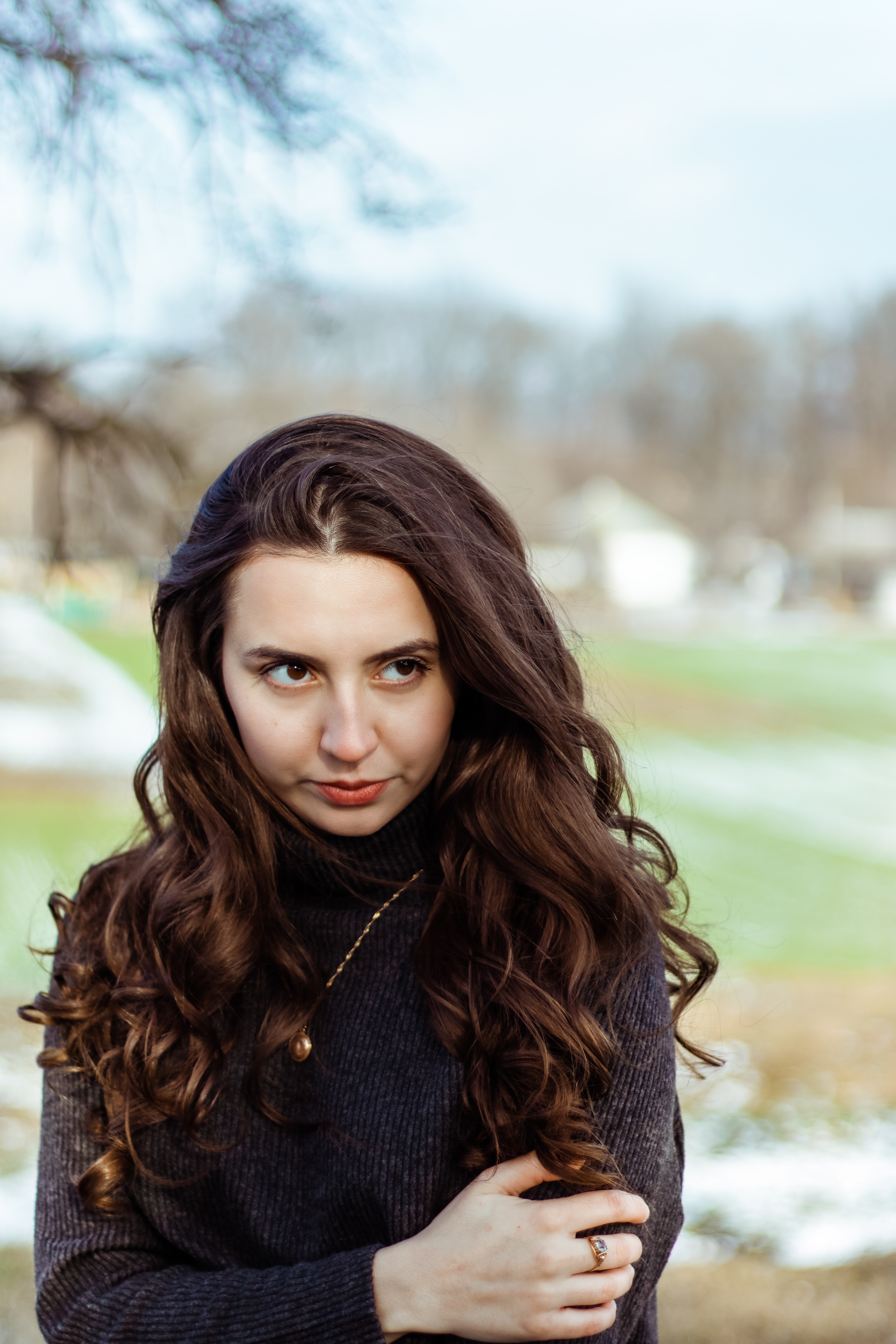 A determined woman standing with her arms crossed | Source: Shutterstock