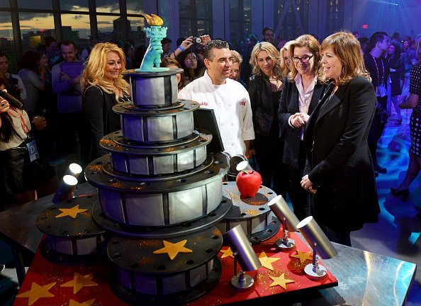 Buddy Valastro, Tribeca Film Festival Executive Vice President Paula Weinstein, and Tribeca Film Festival Co-founder Jane Rosenthal at the Filmmaker Welcome Party during the 2015 Tribeca Film Festival at Spring Studios on April 17, 2015, in New York City. | Source: Getty Images.