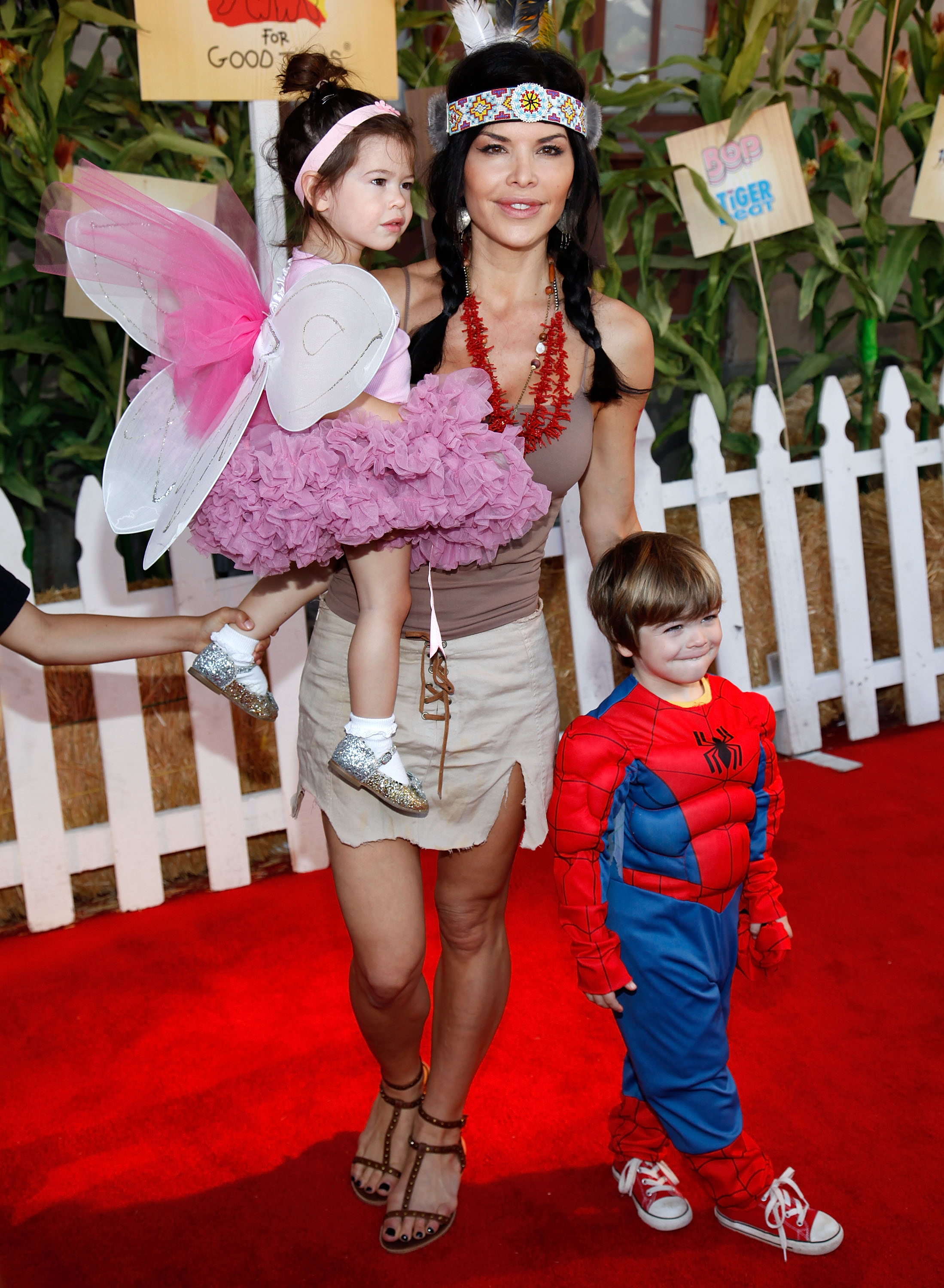 Lauren Sánchez with her children Evan and Ella Whitesell during Camp Ronald McDonald For Good Times' 17th Annual Halloween Carnival at Universal Studios Backlot on October 25, 2009, in Universal City, California | Source: Getty Images