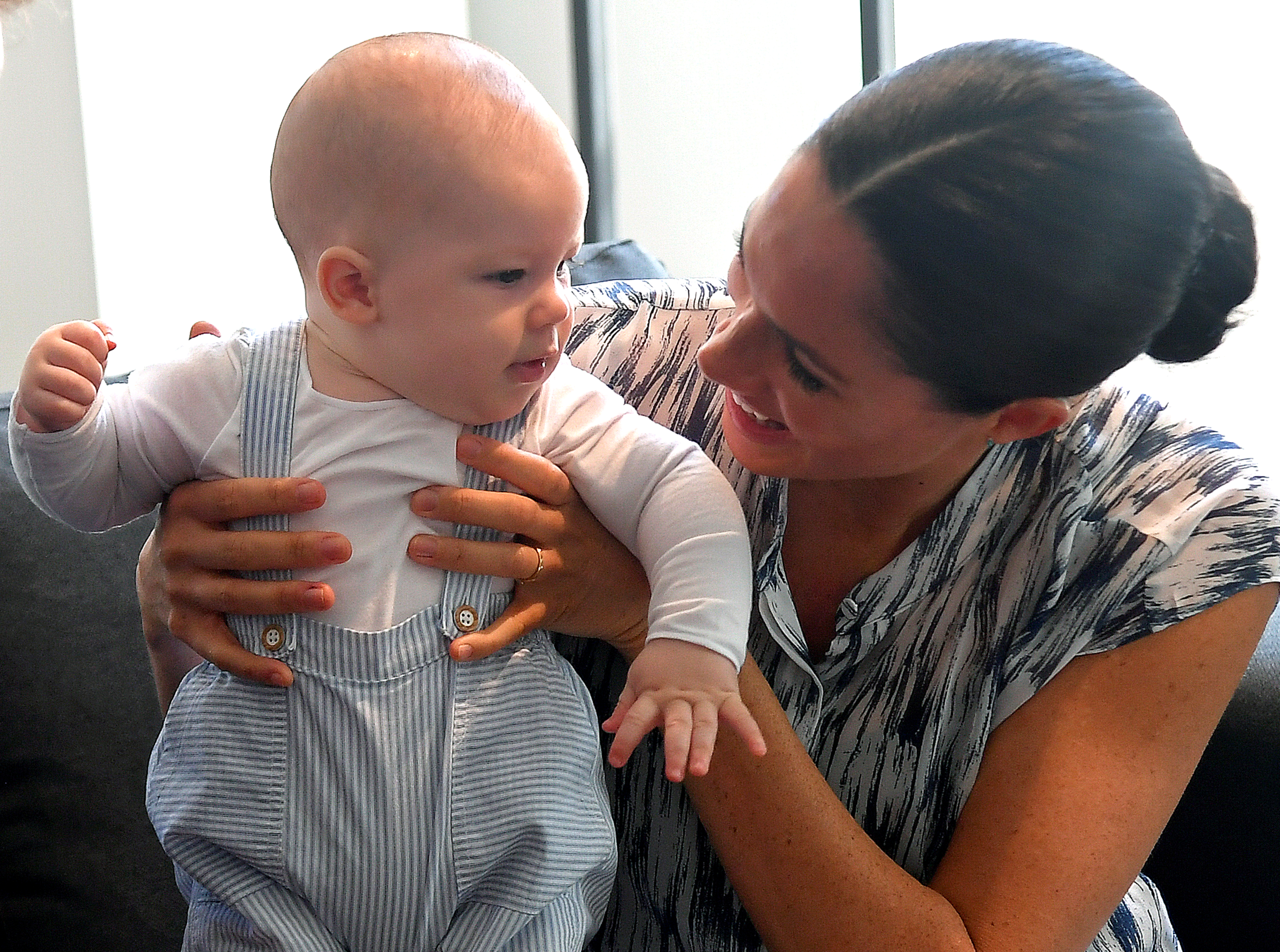 Meghan, Duchess of Sussex laughs as she holds Archie Mountbatten-Windsor at a meeting with Archbishop Desmond Tutu in Cape Town, South Africa, on September 25, 2019. | Source: Getty Images