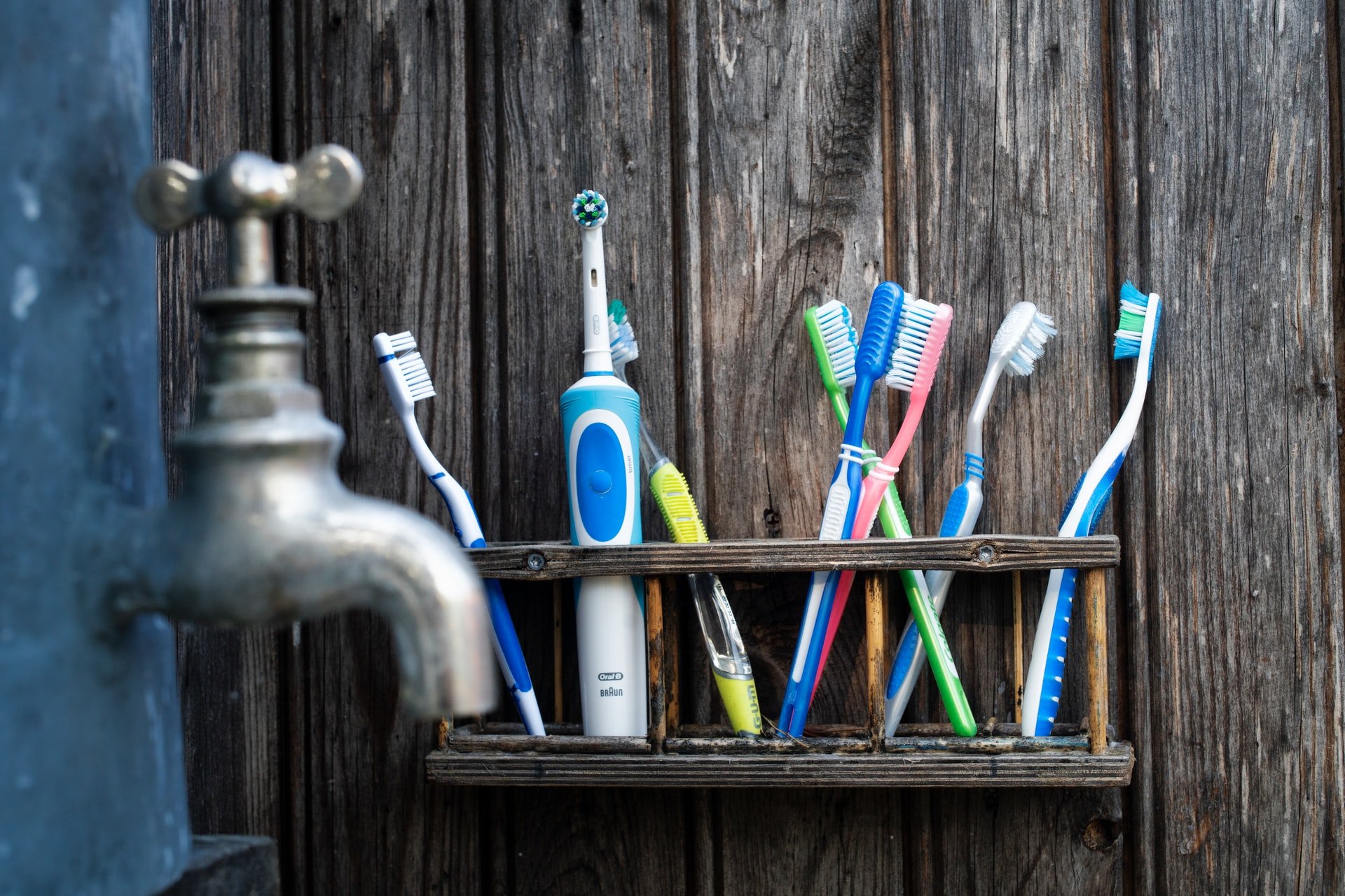 Toothbrushes in the man's bathroom | Source: Unsplash 