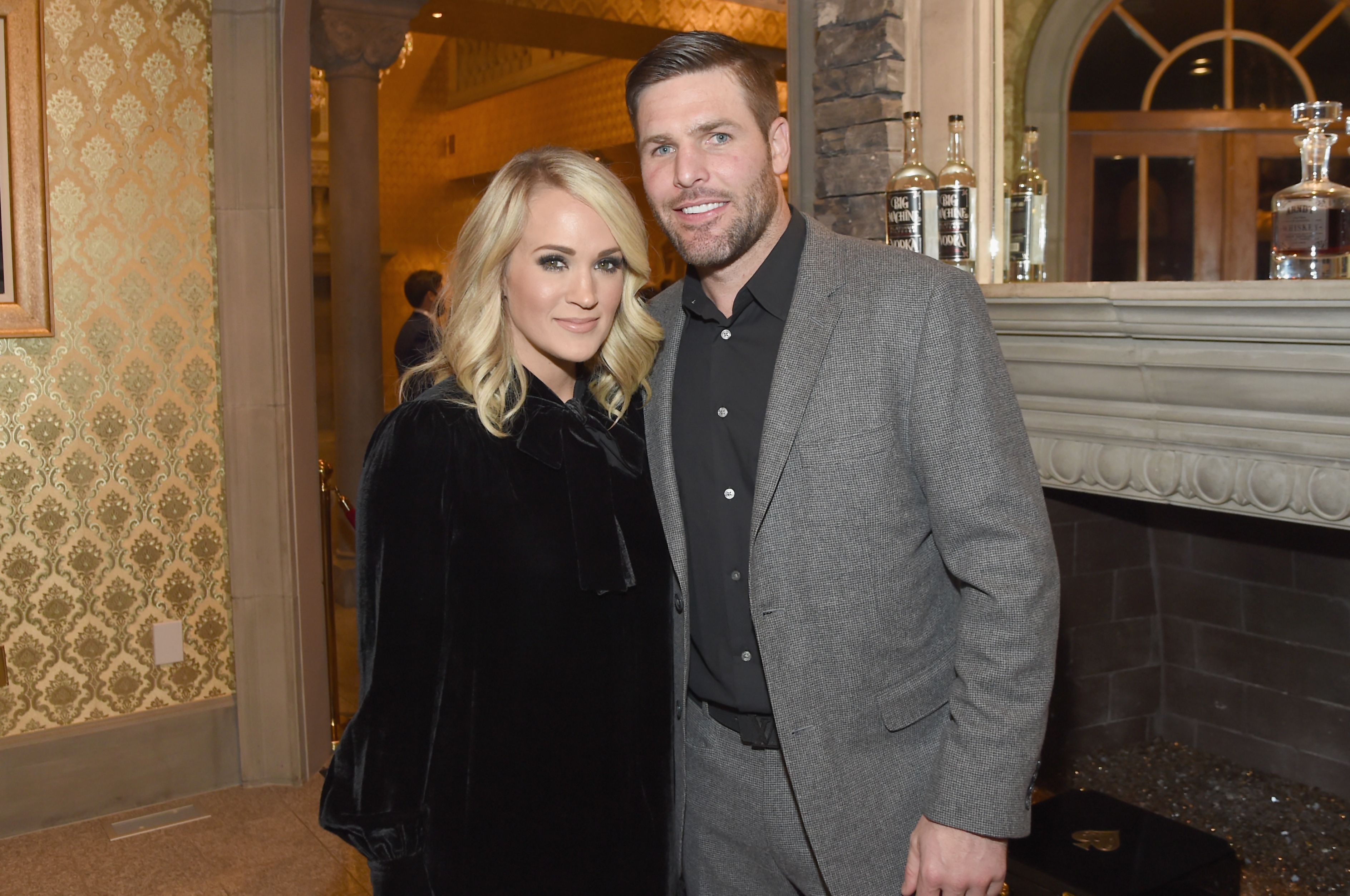 Carrie Underwood and Mike Fisher at Nashville Shines for Haiti on October 24, 2017, in Brentwood, Tennessee. | Source: Rick Diamond/Getty Images