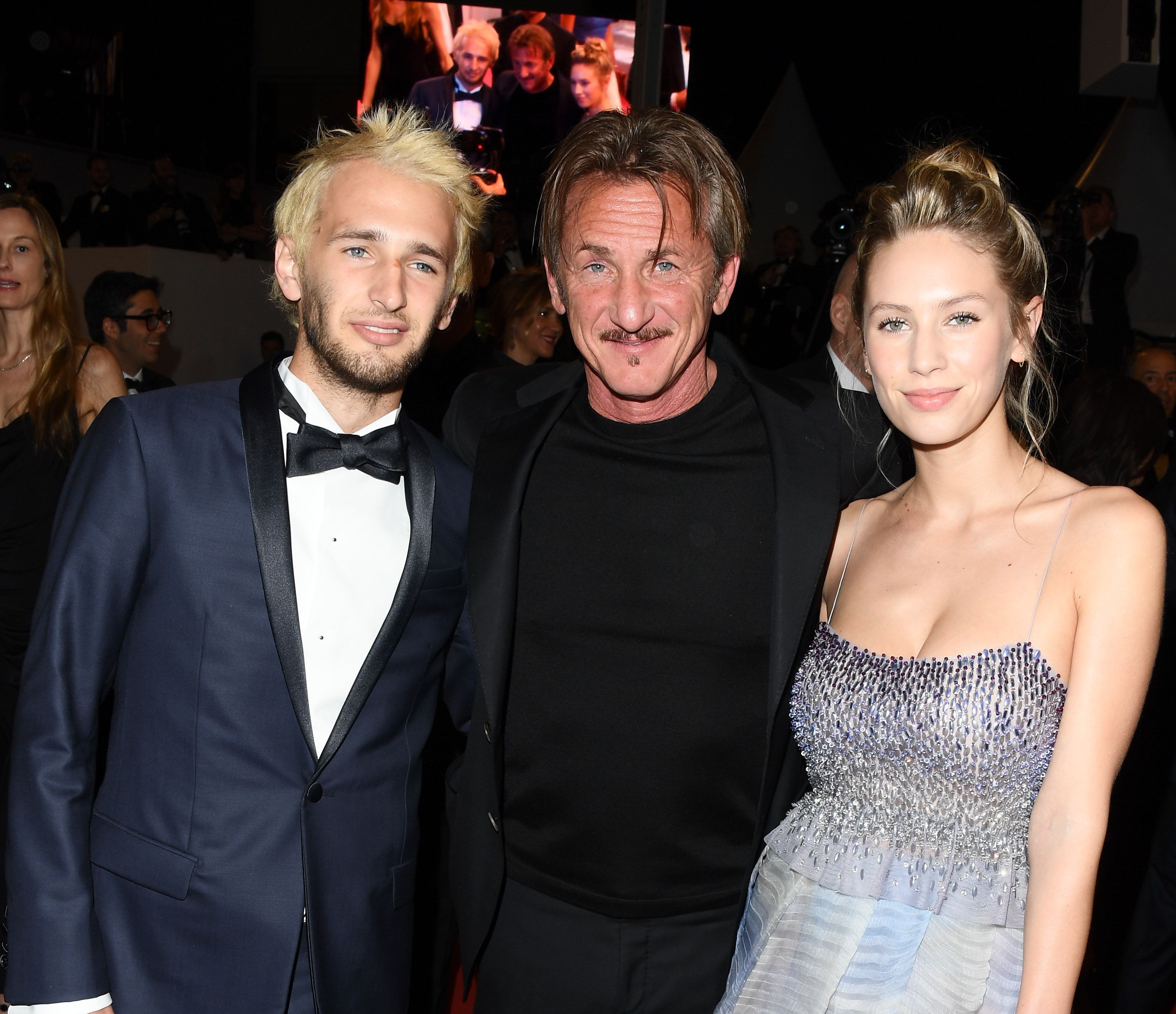 Hopper, Sean, and Dylan Penn leaving the premiere of "The Last Face" during the 69th annual Cannes Film Festival on May 20, 2016, in France | Photo: George Pimentel/WireImage/Getty Images