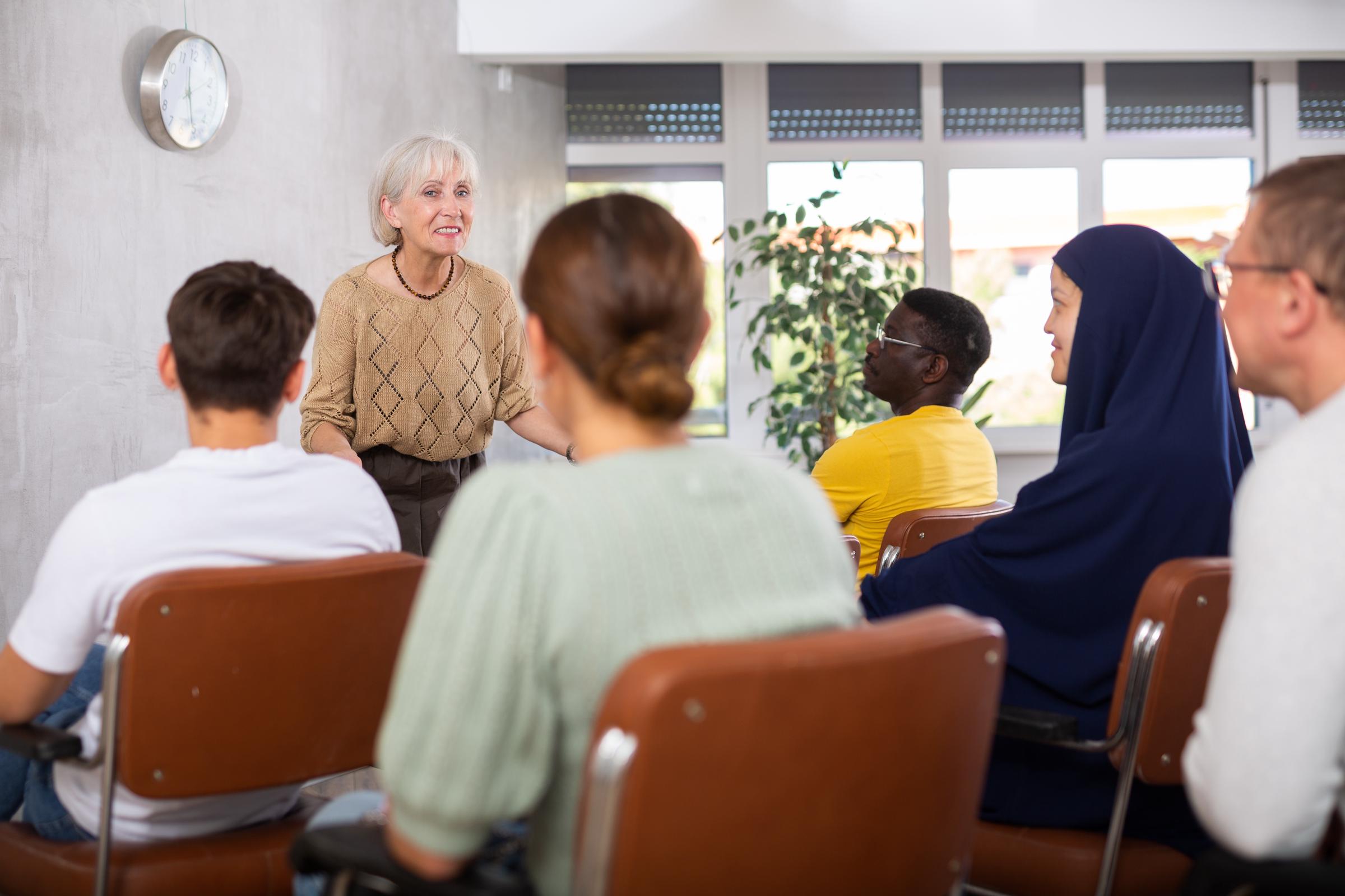 A woman teaching a class | Source: Shutterstock