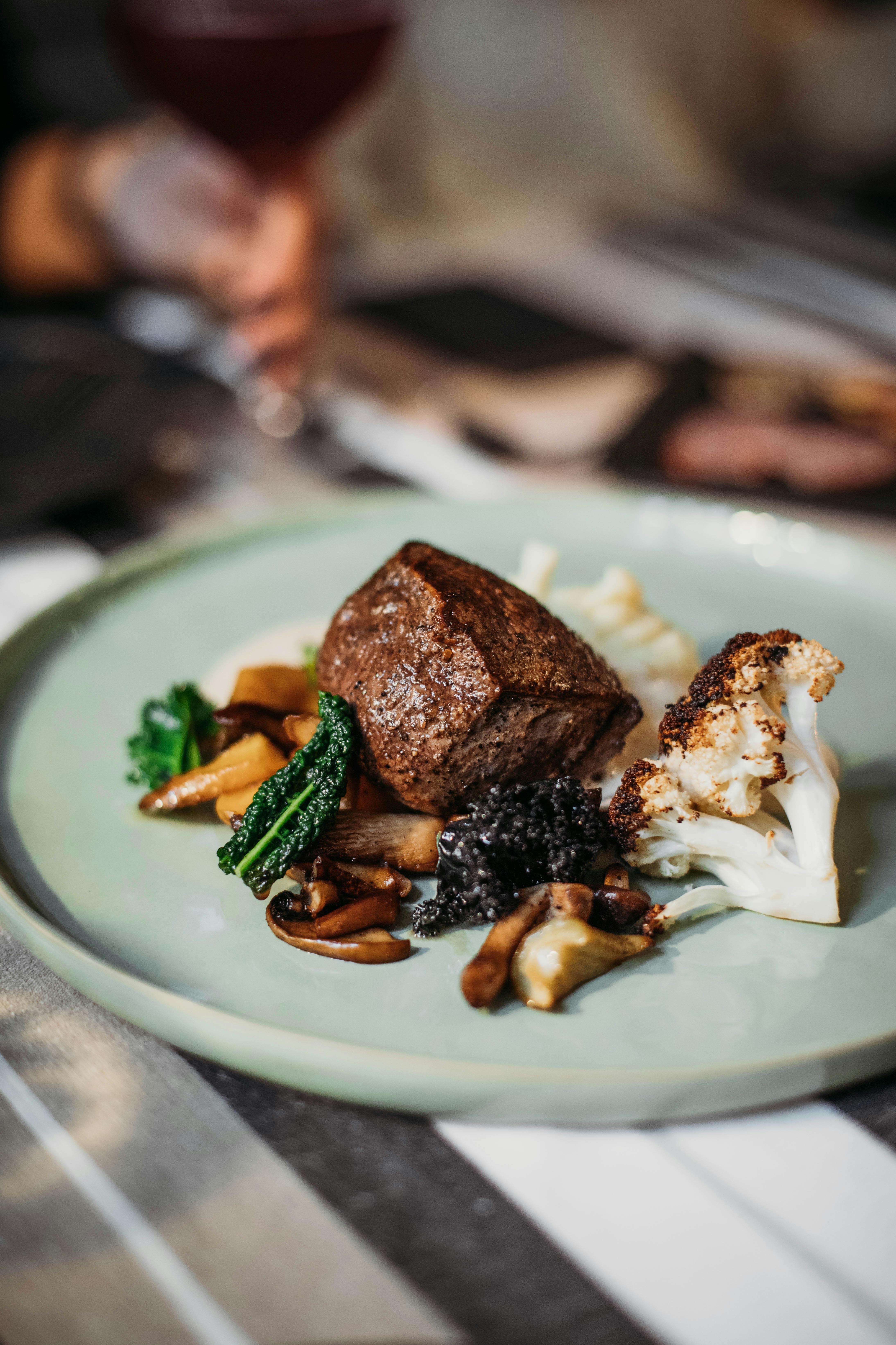 Steak served with cauliflower | Source: Pexels