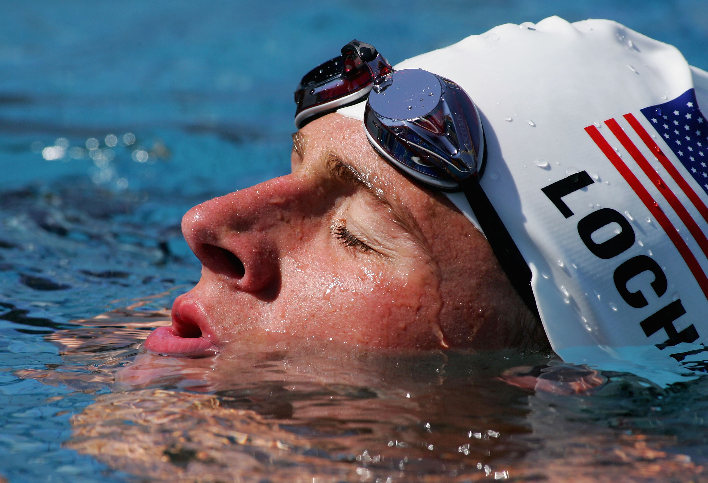 Ryan Lochte competes in the men's swimming 200 metre individual medley heat during the Athens 2004 Summer Olympic Games in Athens, Greece, on August 18, 2004. | Source: Getty Images