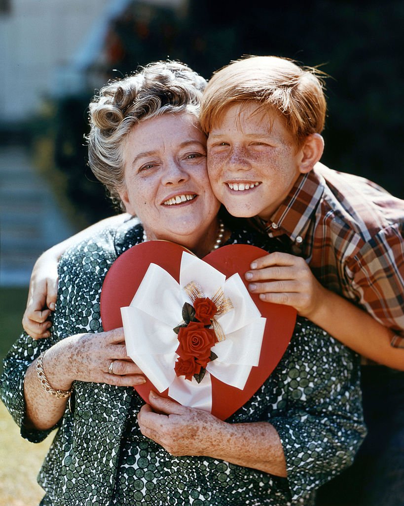 Frances Bavier and Ron Howard pose cheek to cheek in a portrait for the US television series, 'The Andy Griffith Show', USA, circa 1960. | Source: Getty Images