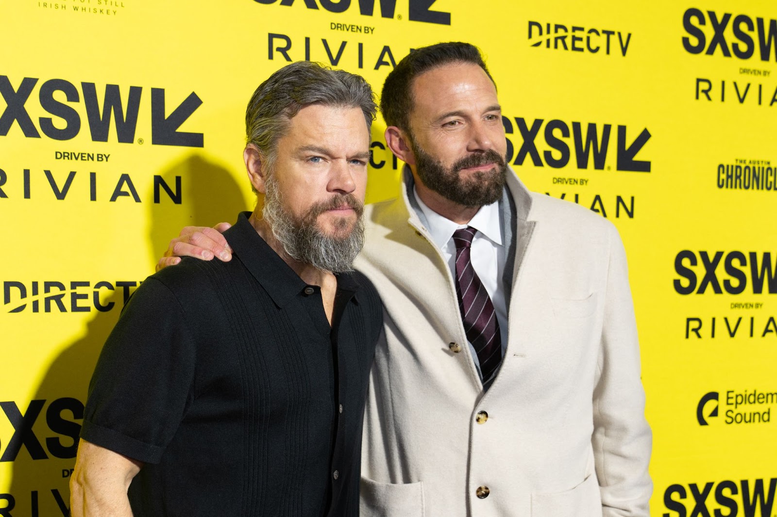 Matt Damon and Ben Affleck posing together at the Austin Convention Center | Source: Getty Images