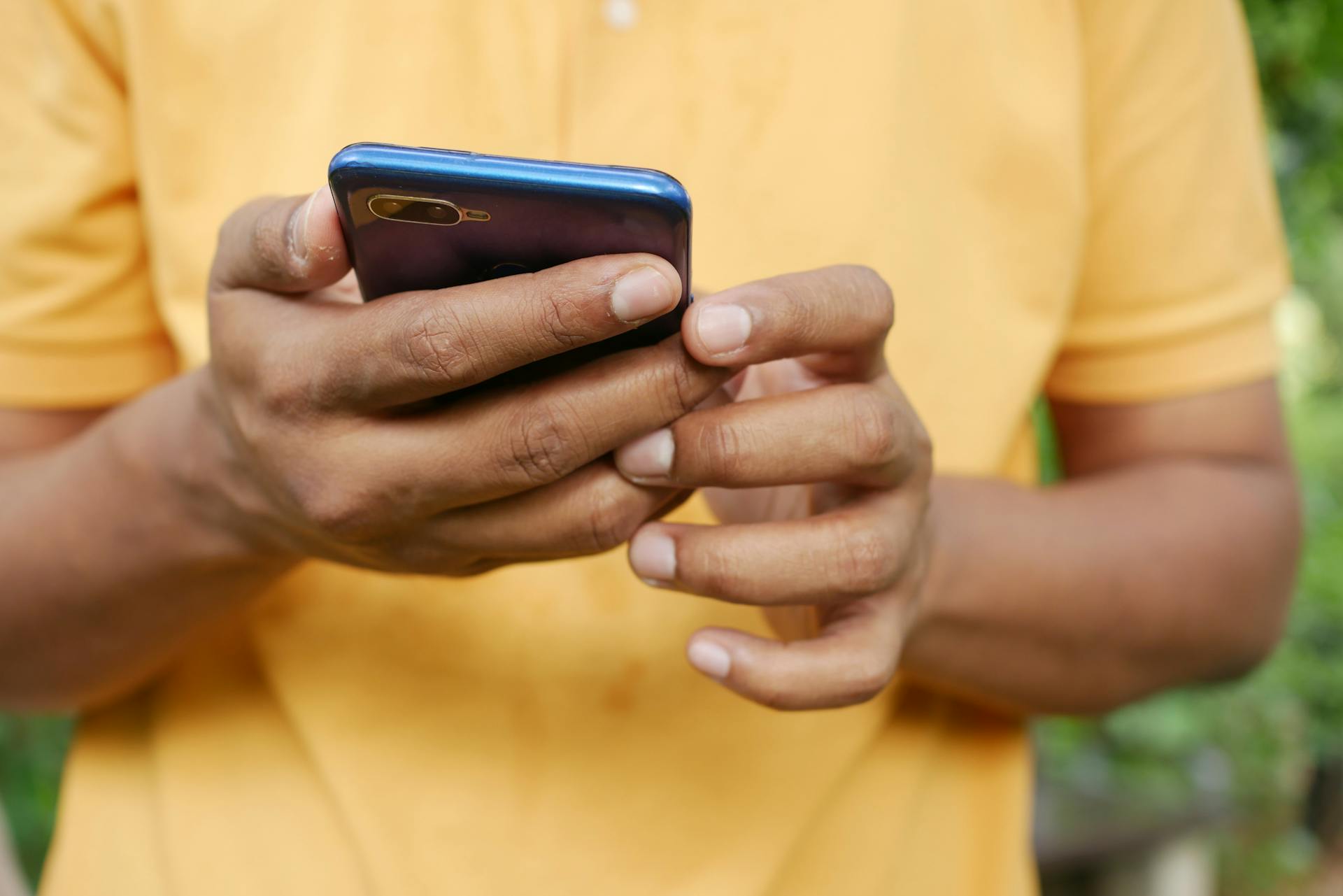 A man using his phone | Source: Pexels