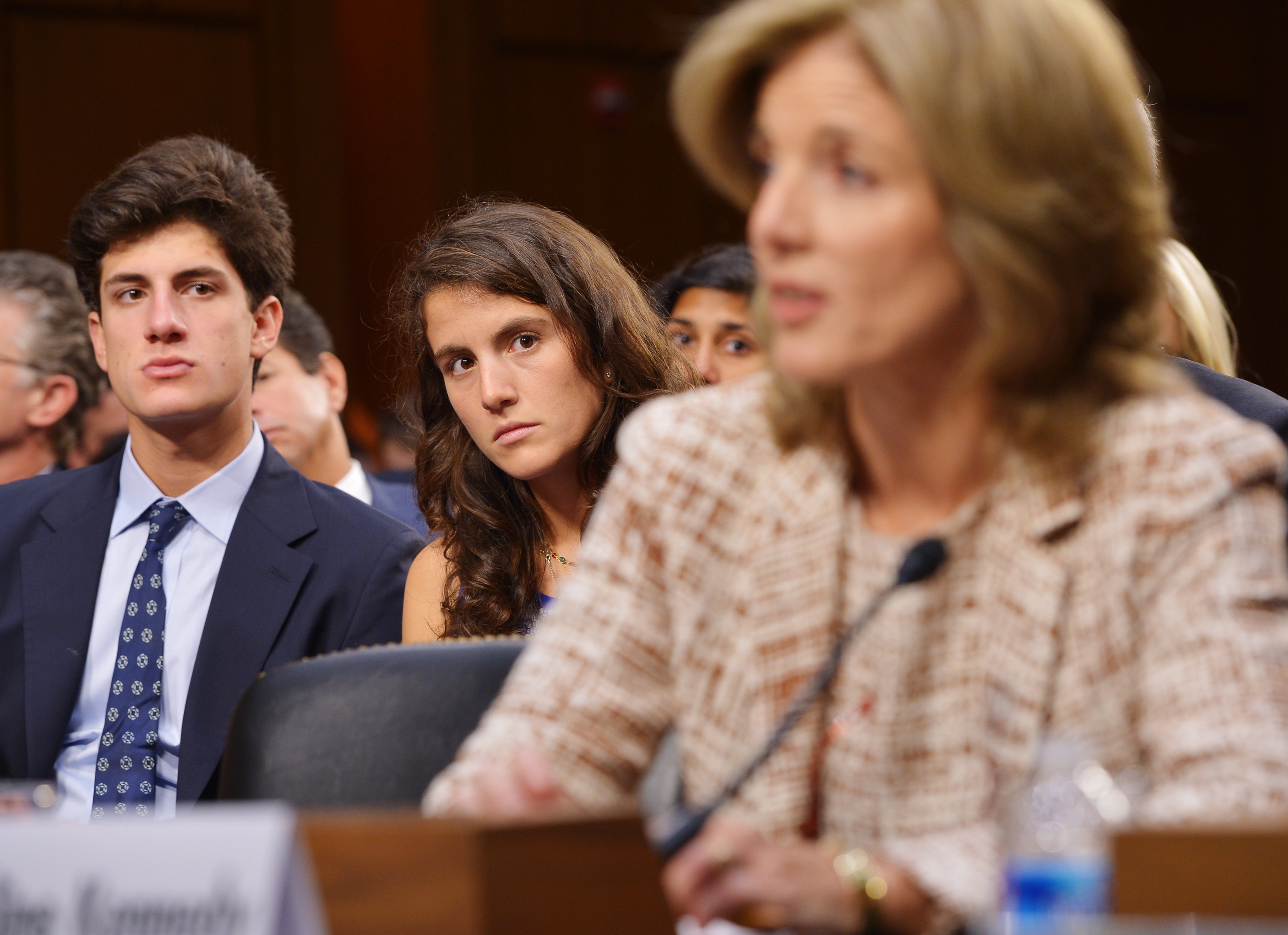 Like most of the family, Tatiana Schlossberg and her sibling observed their mother performing tireless work for the greater good. In this photo, they witnessed Caroline Kennedy testifying before the Senate Foreign Relations Committee on her nomination to be ambassador to Japan in the Hart Senate Office Building on Capitol Hill on September 19, 2013, in Washington, DC. | Source: Getty Images