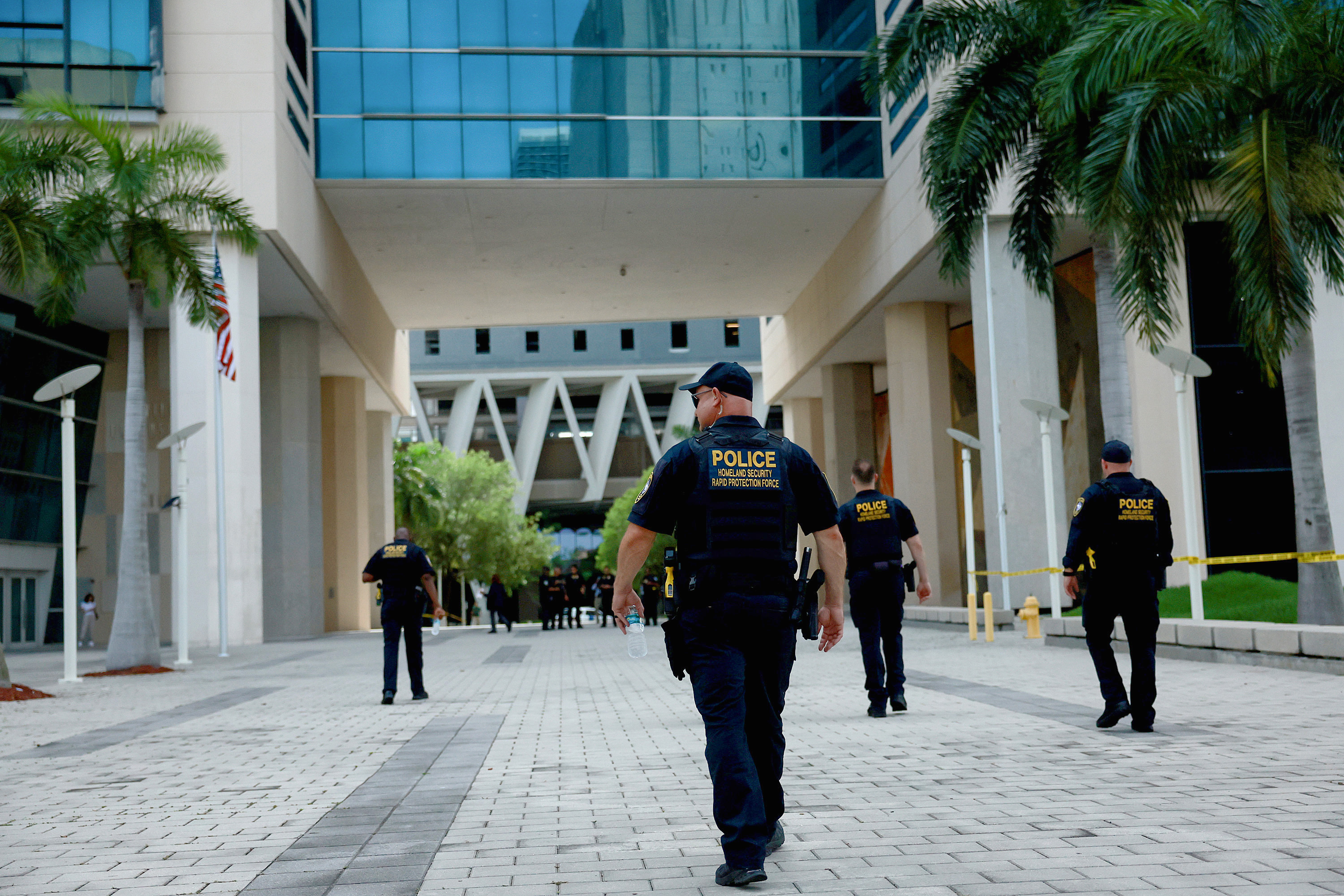 Department of Homeland Security police walking around the Wilkie D. Ferguson Jr. United States Federal Courthouse in Miami, Florida on June 12, 2023 | Source: Getty Images
