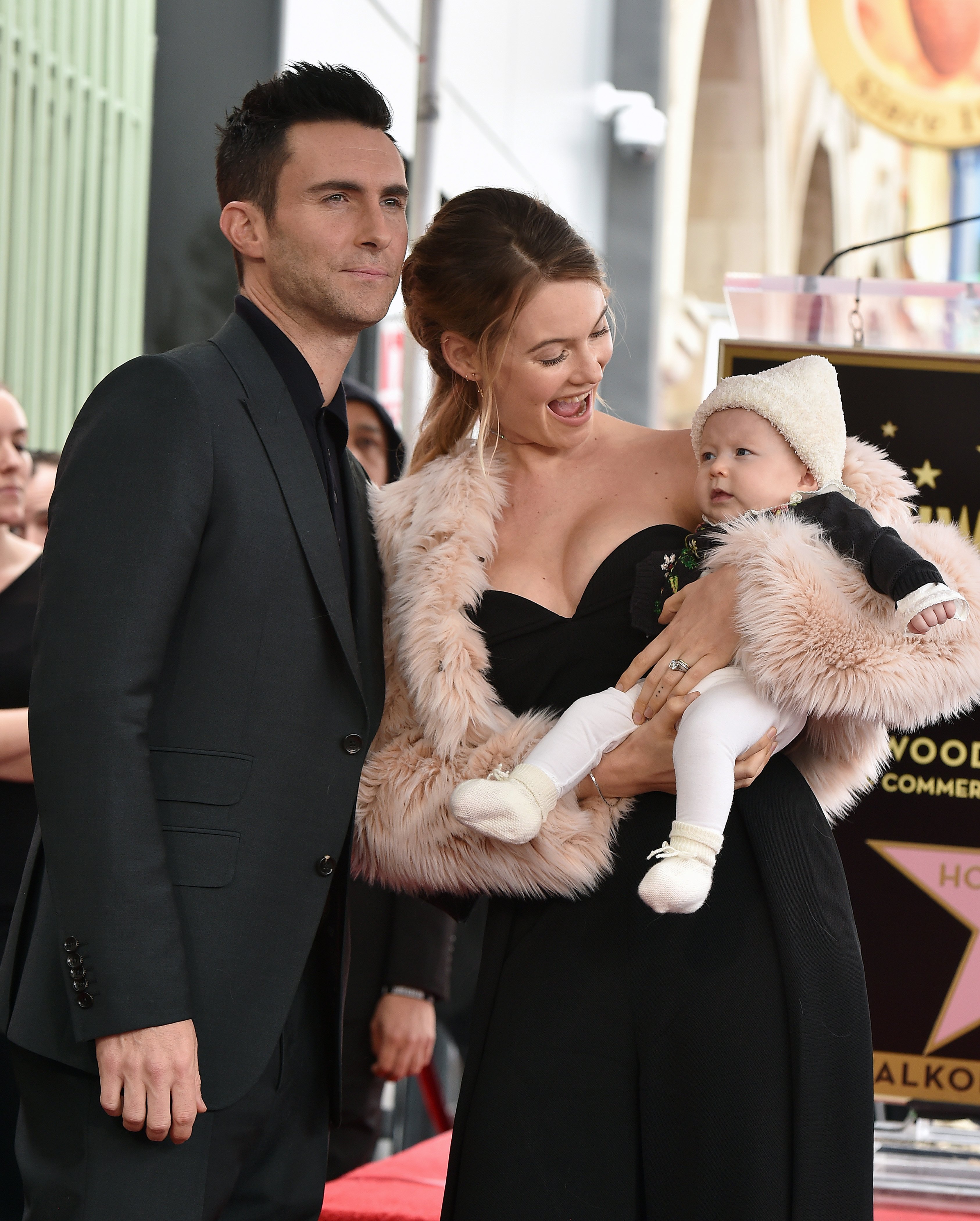 Adam Levine, his wife Behati Prinsloo, and their daughter Dusty Rose Levine at the Hollywood Walk of Fame on February 10, 2017, in Hollywood, California | Source: Getty Images
