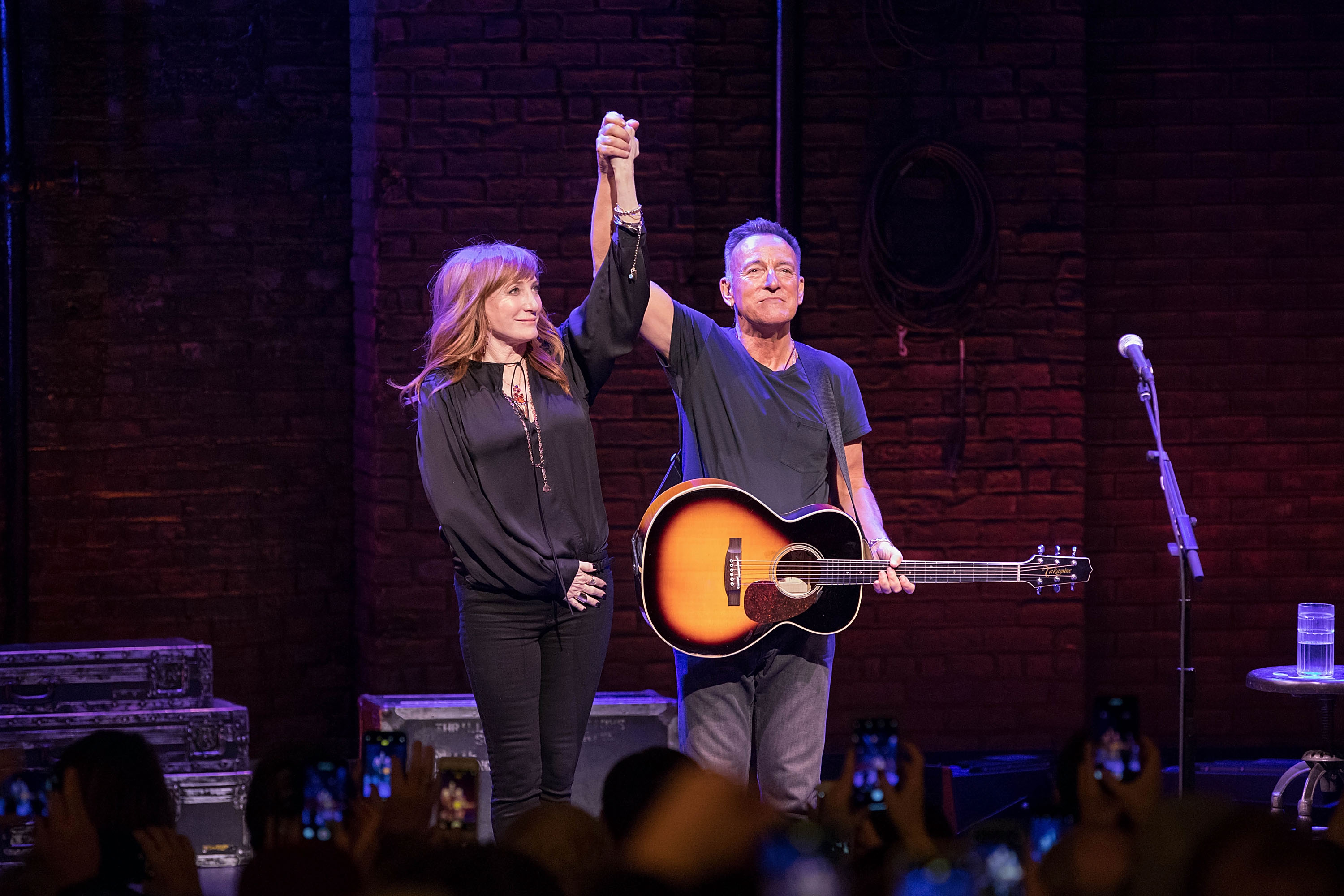 Patti Scialfa and Bruce Springsteen taking their final "Springsteen on Broadway" curtain call at Walter Kerr Theatre on December 15, 2018, in New York. | Source: Getty Images