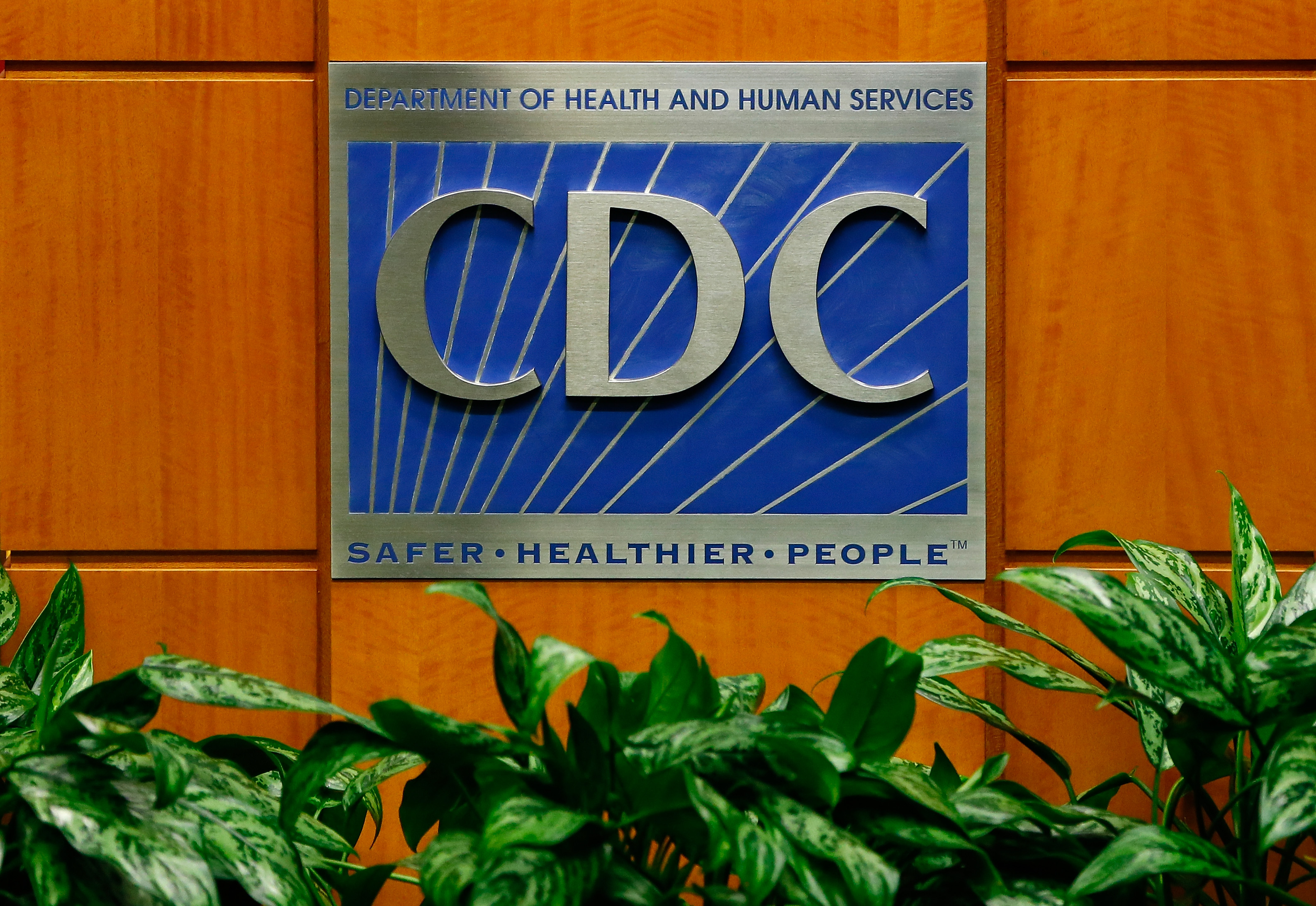 A picture of the CDC's logo and signage at the Tom Harkin Global Communications Center in Atlanta, Georgia on October 5, 2014. | Source: Getty Images