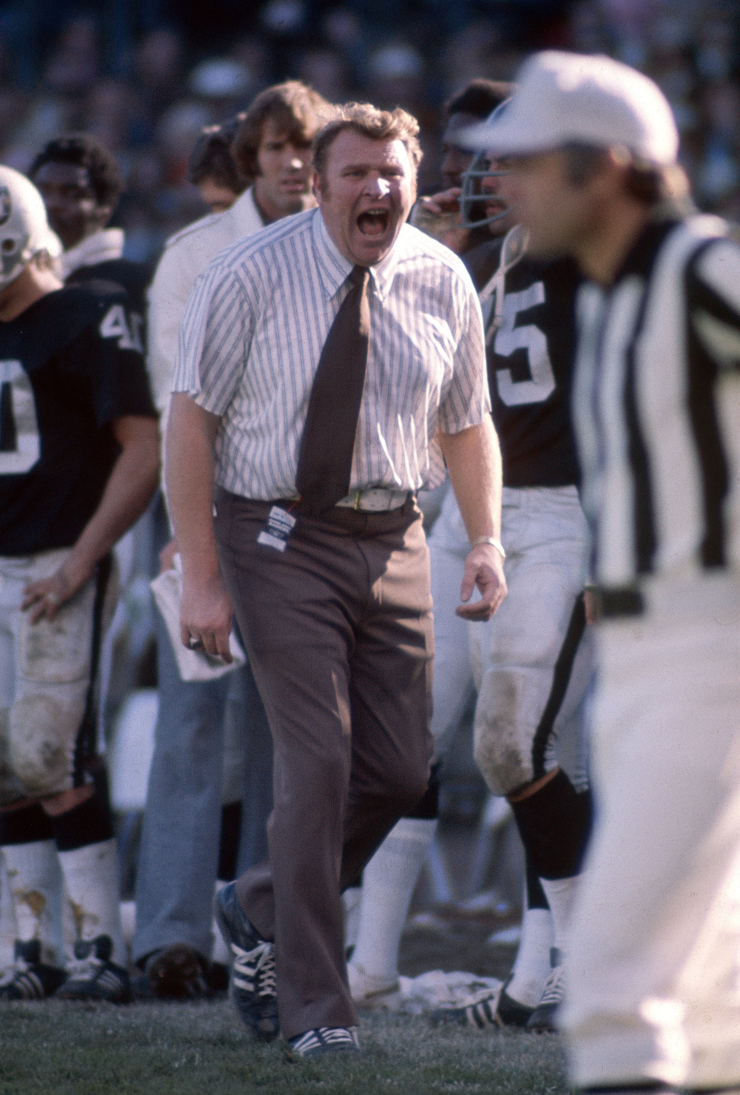 John Madden head coach of the Oakland Raiders shouts at the referee from the sideline during an NFL game at the Oakland Coliseum in 1970s, in Oakland, California.| Source: Getty Images