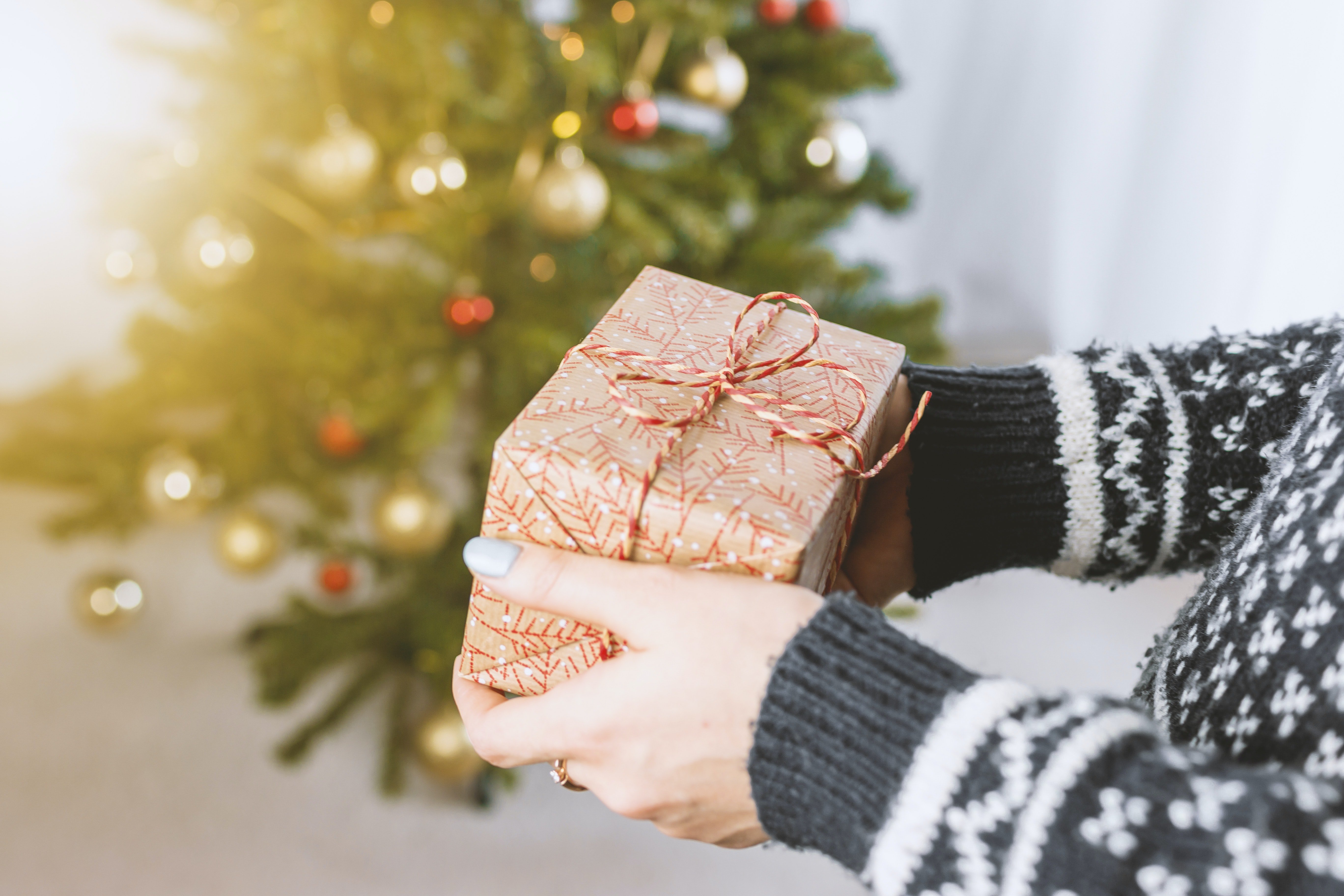 OP bought gifts for her family members too & was unsure if it was right considering her financial situation | Photo: Unsplash  