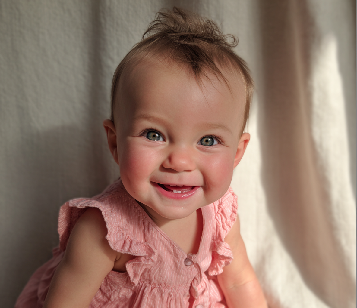 A smiling baby girl | Source: Midjourney