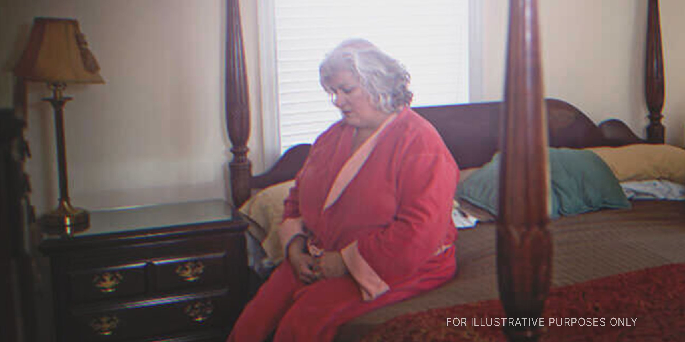 Sad elderly woman sitting in bedroom | Source: Shutterstock