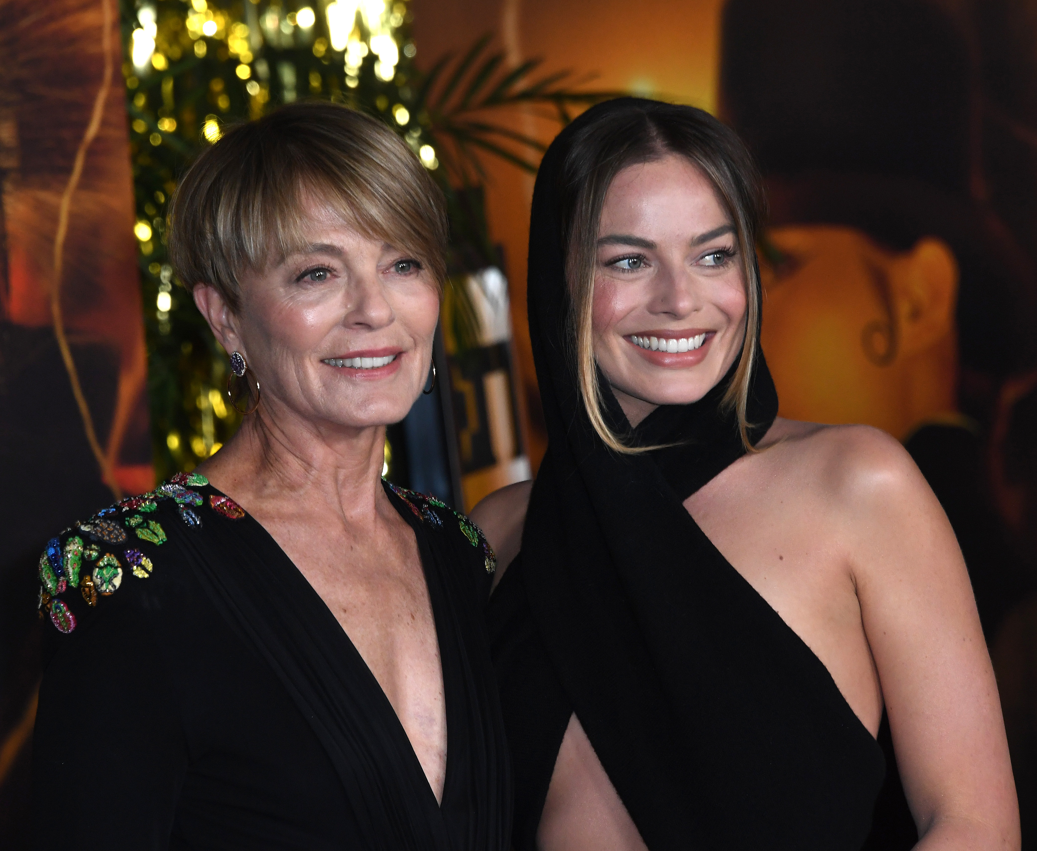 She hesitates to talk about her dad. At this event, Margot Robbie and her mother attended the "Babylon" Global Premiere Screening held at Academy Museum of Motion Pictures on December 15, 2022, in Los Angeles, California. | Source: Getty Images