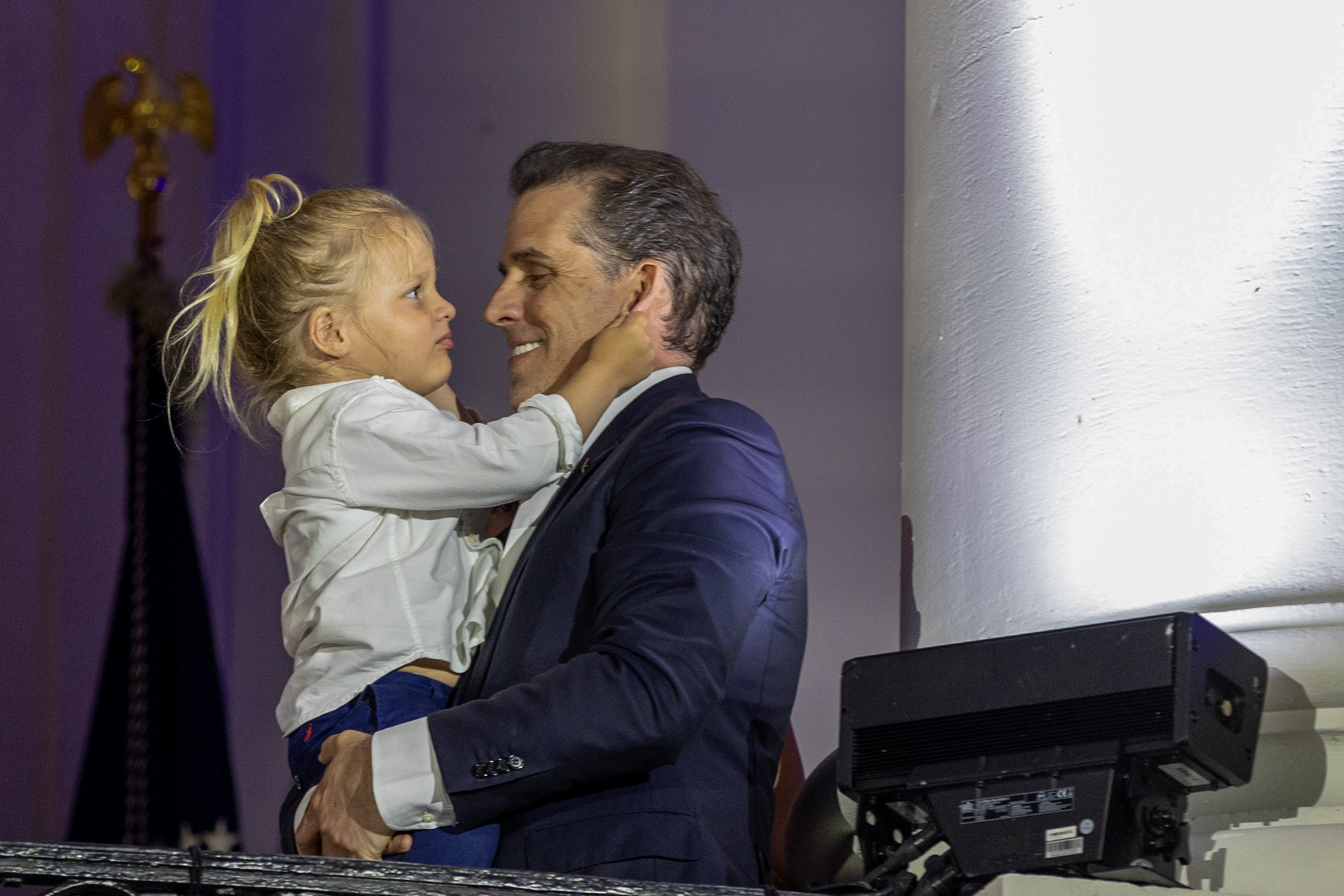Hunter Biden holds his son Beau while watching fireworks on the South Lawn of the White House on July 4, 2023, in Washington, D.C. | Source: Getty Images