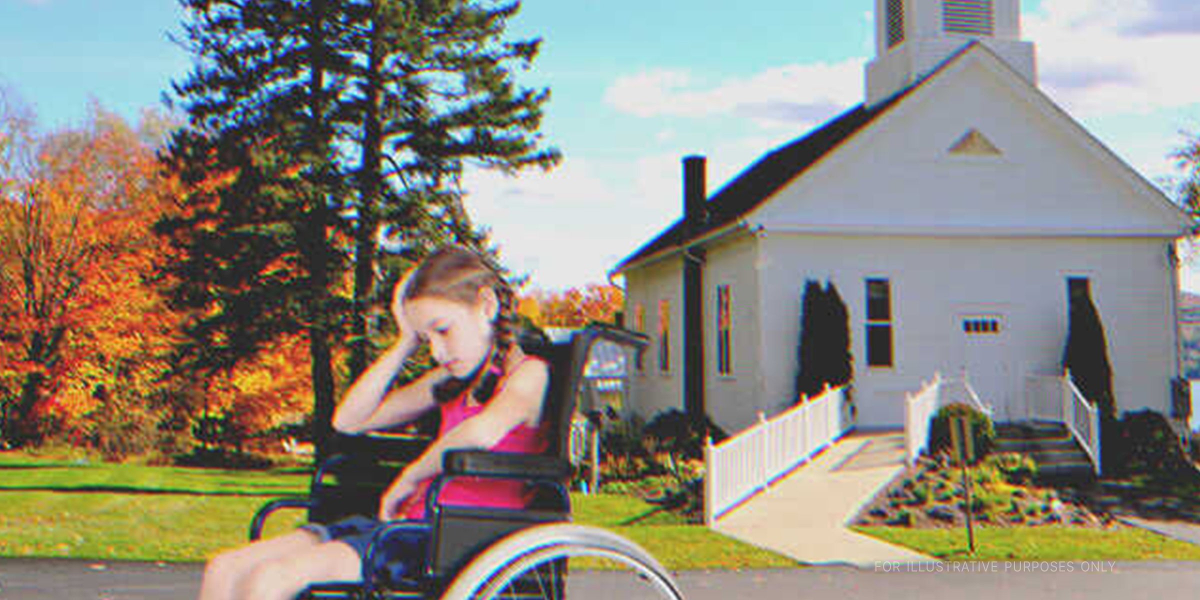 A girl in a wheelchair in front of a church | Source: Shutterstock
