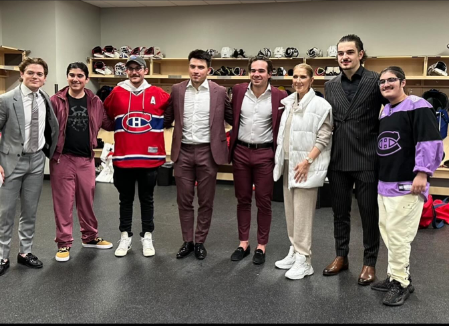 Celine Dion with her sons and others in the Montreal Canadiens locker room | Source: Instagram.com/celinedion