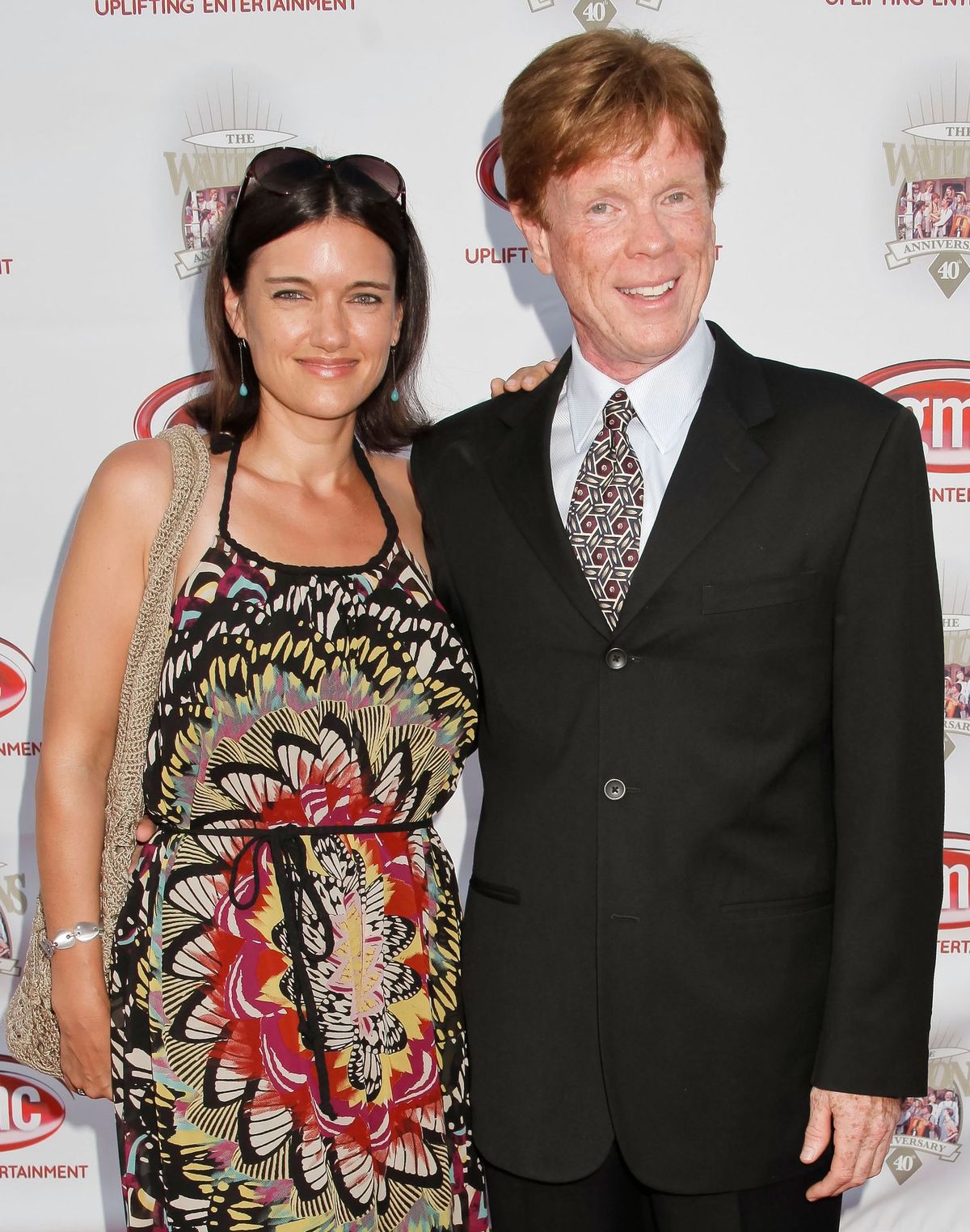 Jon Walmsley and a guest at the "The Waltons" 40th anniversary reunion on September 29, 2012, in Los Angeles, California | Photo: Tibrina Hobson/WireImage/Getty Images