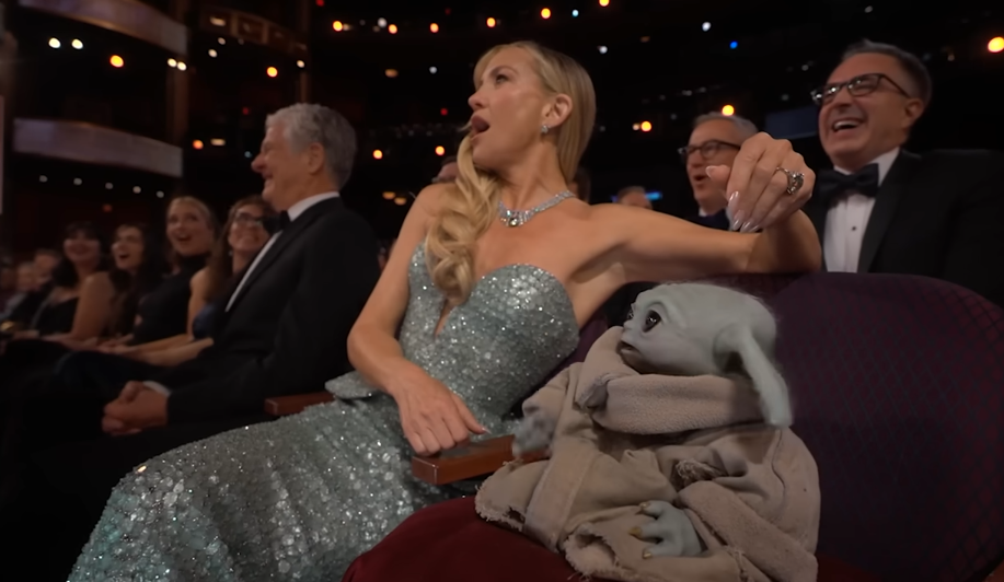 Kate Hudson and Grogu react to Sigourney Weaver's line at the 98th Academy Awards on March 15, 2026 | Source: YouTube/Star Wars