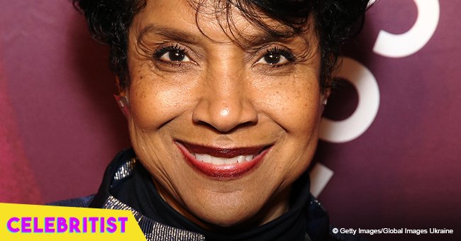 Phylicia Rashad's only daughter turns heads in red off-shoulder dress in rare photo with father