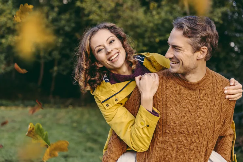 A happy couple enjoying the outdoors. | Photo: Getty Images