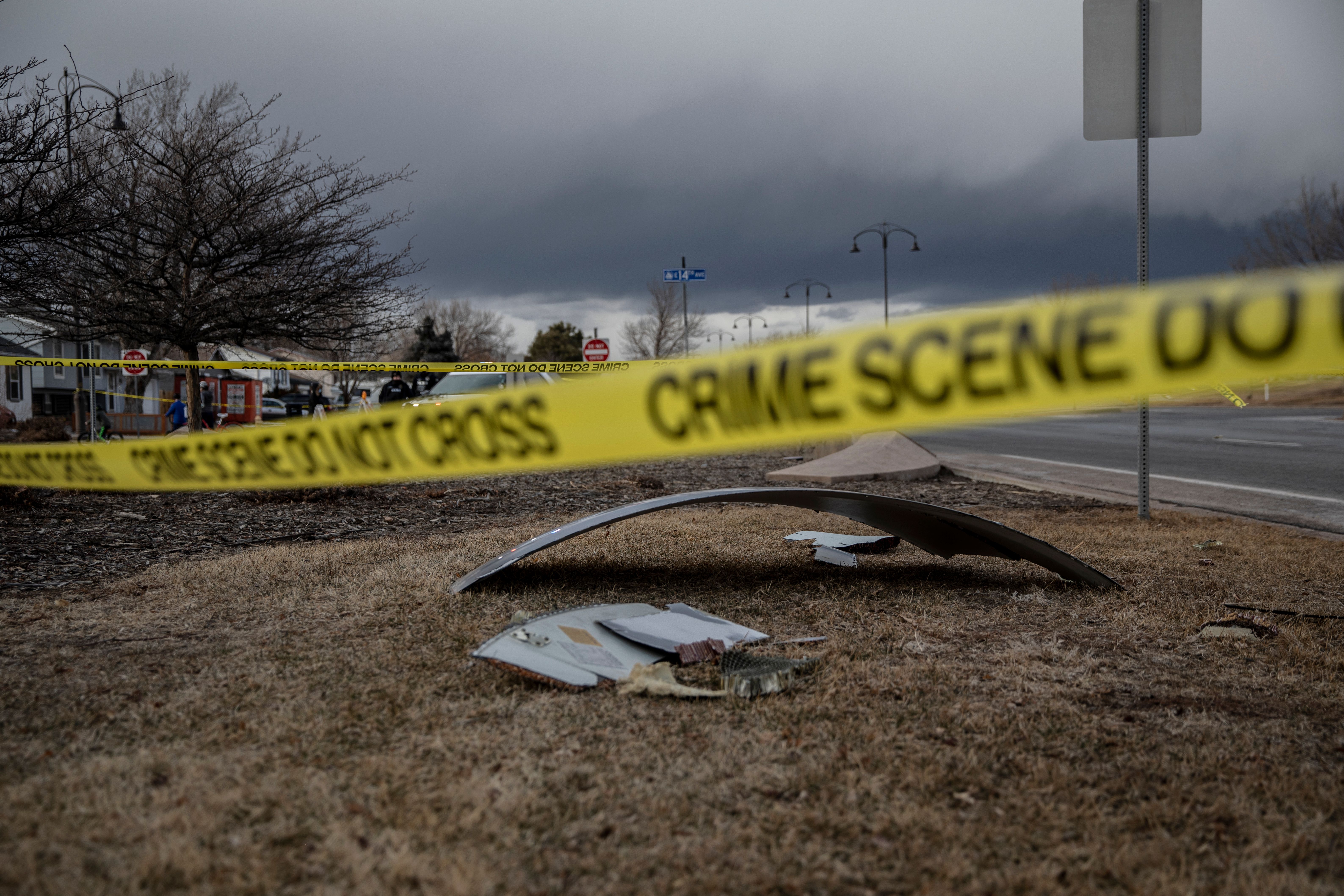 Debris that has fallen from a United Airlines Flight 328 airplane's engine lay scattered through the neighborhood of Broomfield, outside Denver, Colorado, on February 20, 2021 | Photo: Getty Images