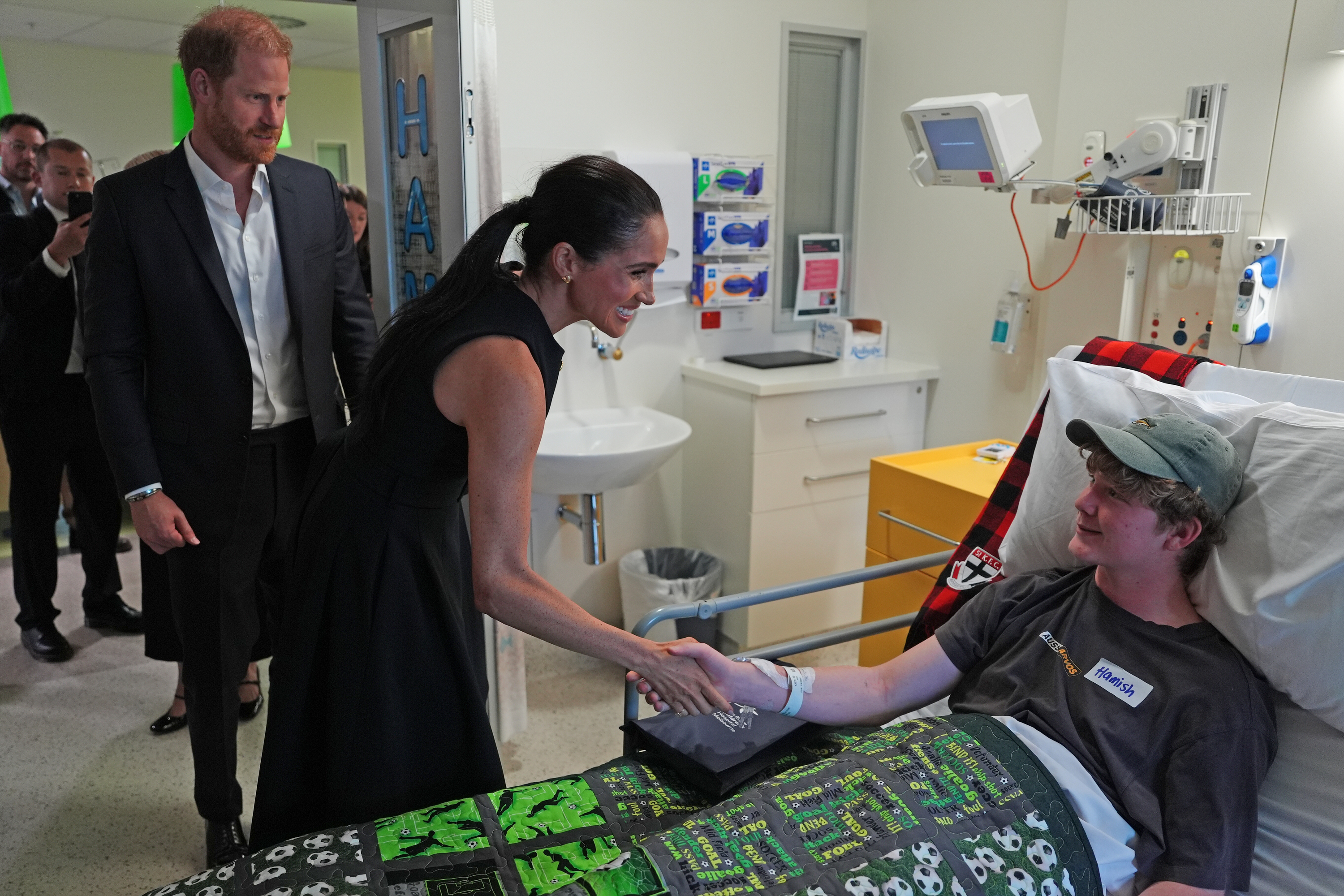 Meghan, Duchess of Sussex and Prince Harry, Duke of Sussex visit patient Hamish at the Royal Children's Hospital on 14 April 2026 in Melbourne, Australia. | Source: Getty Images