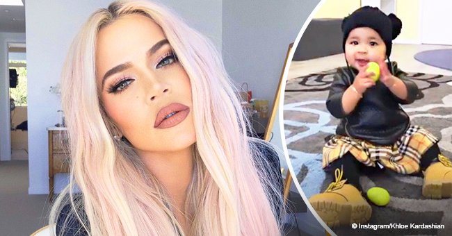 Khloé Kardashian melts hearts with video of True in checked Burberry skirt & beanie with pom poms