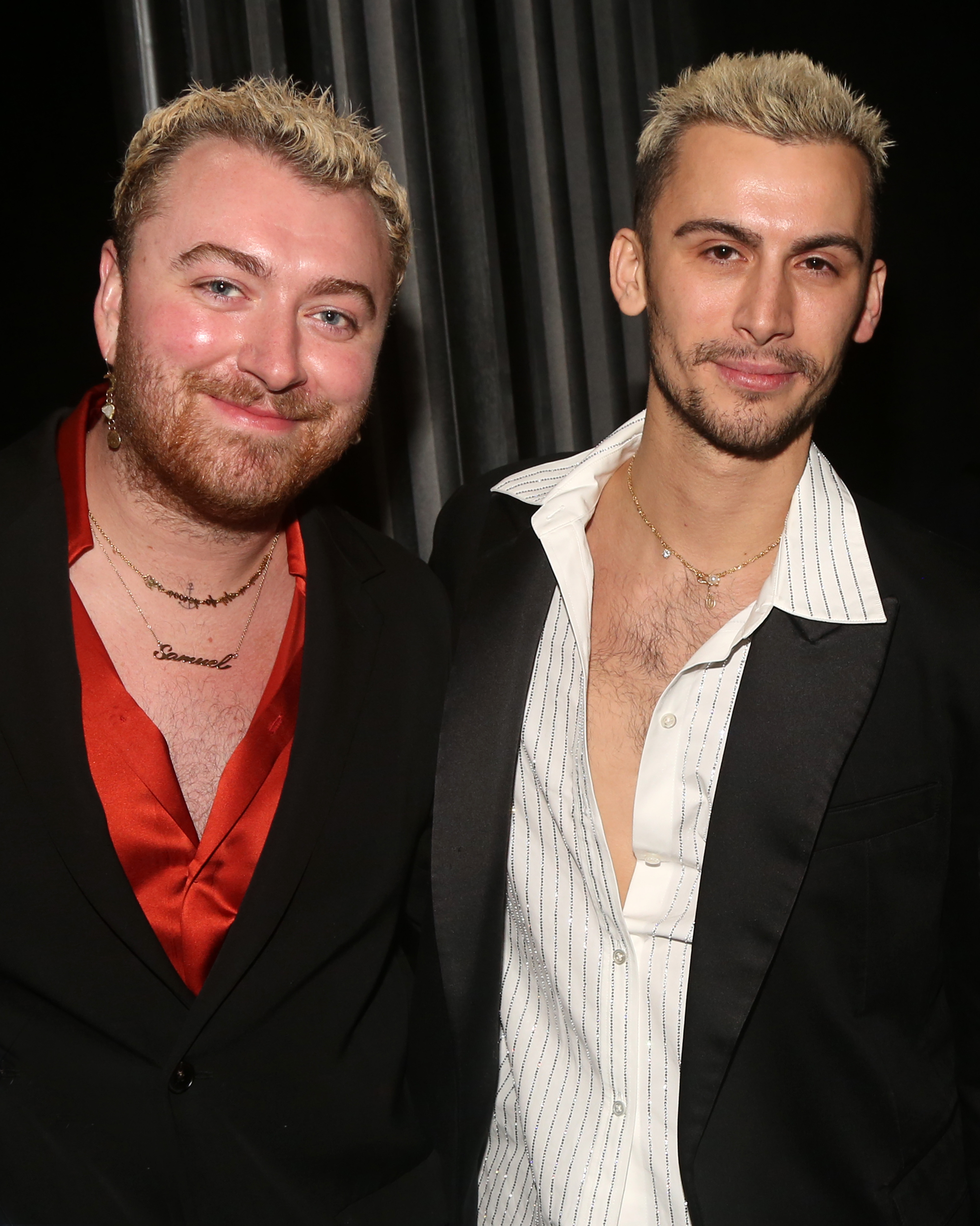 Sam Smith and Christian Cowan pose backstage at the musical "Some Like it Hot" on Broadway at The Shubert Theater on February 17, 2023, in New York City | Source: Getty Images