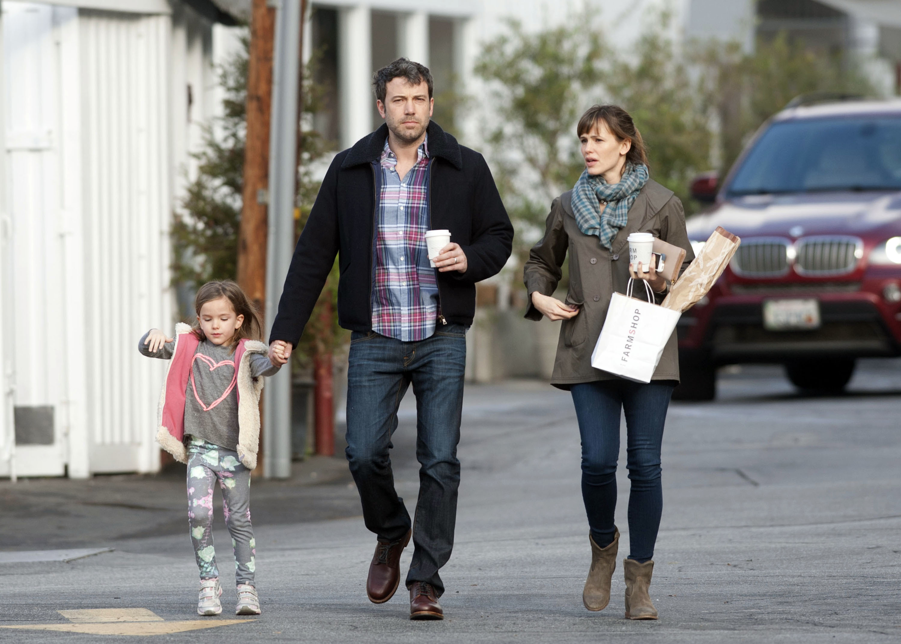 Ben Affleck and Jennifer Garner are seen with their daughter, Seraphina Affleck on February 6, 2014, in Los Angeles, California. | Source: Getty Images