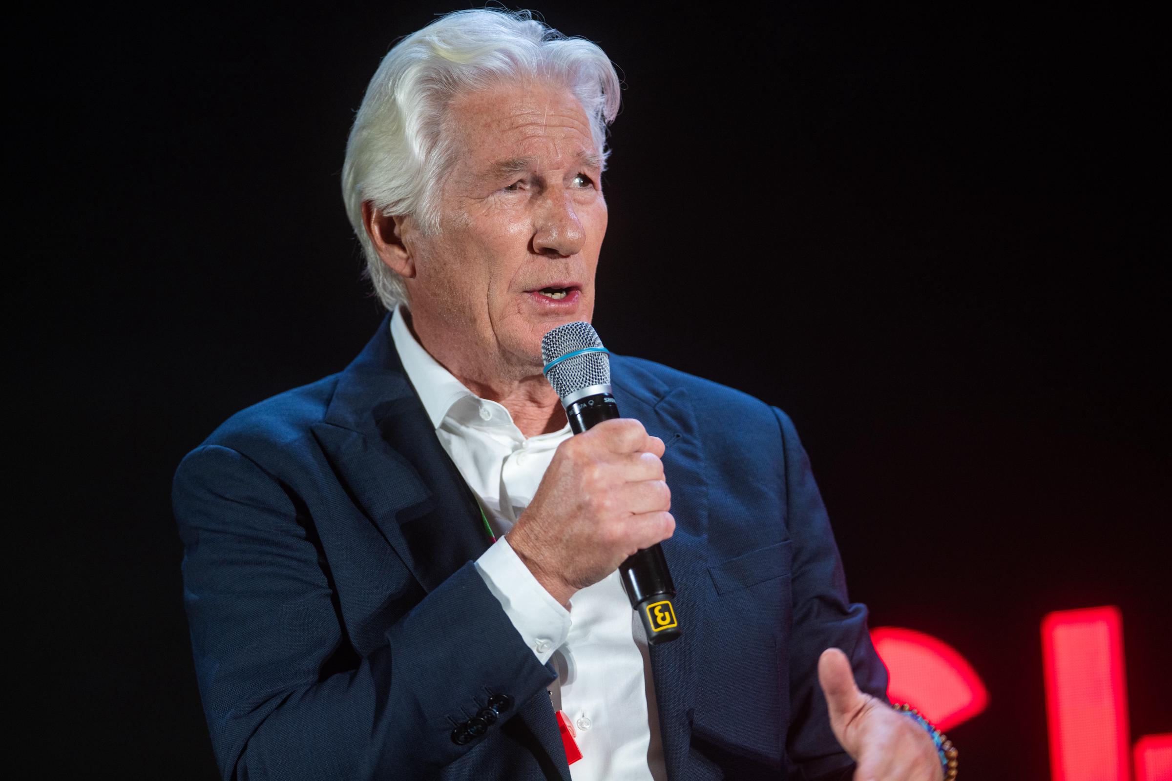 Gere, now 76, stepped out in Barcelona for the 10th anniversary of Open Arms looking every bit the silver screen icon. With his salt-and-pepper hair swept back, tailored navy blazer, and easygoing charm, he struck a balance between polished and relaxed — aging gracefully with the quiet confidence of someone who's never had to try too hard.