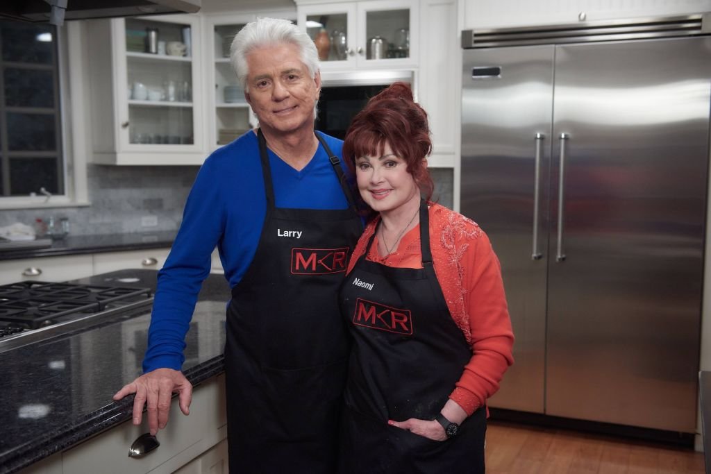 Larry Strickland and Naomi Judd during the Dinner Parties episode of "My Kitchen Rules." | Source: Getty Images