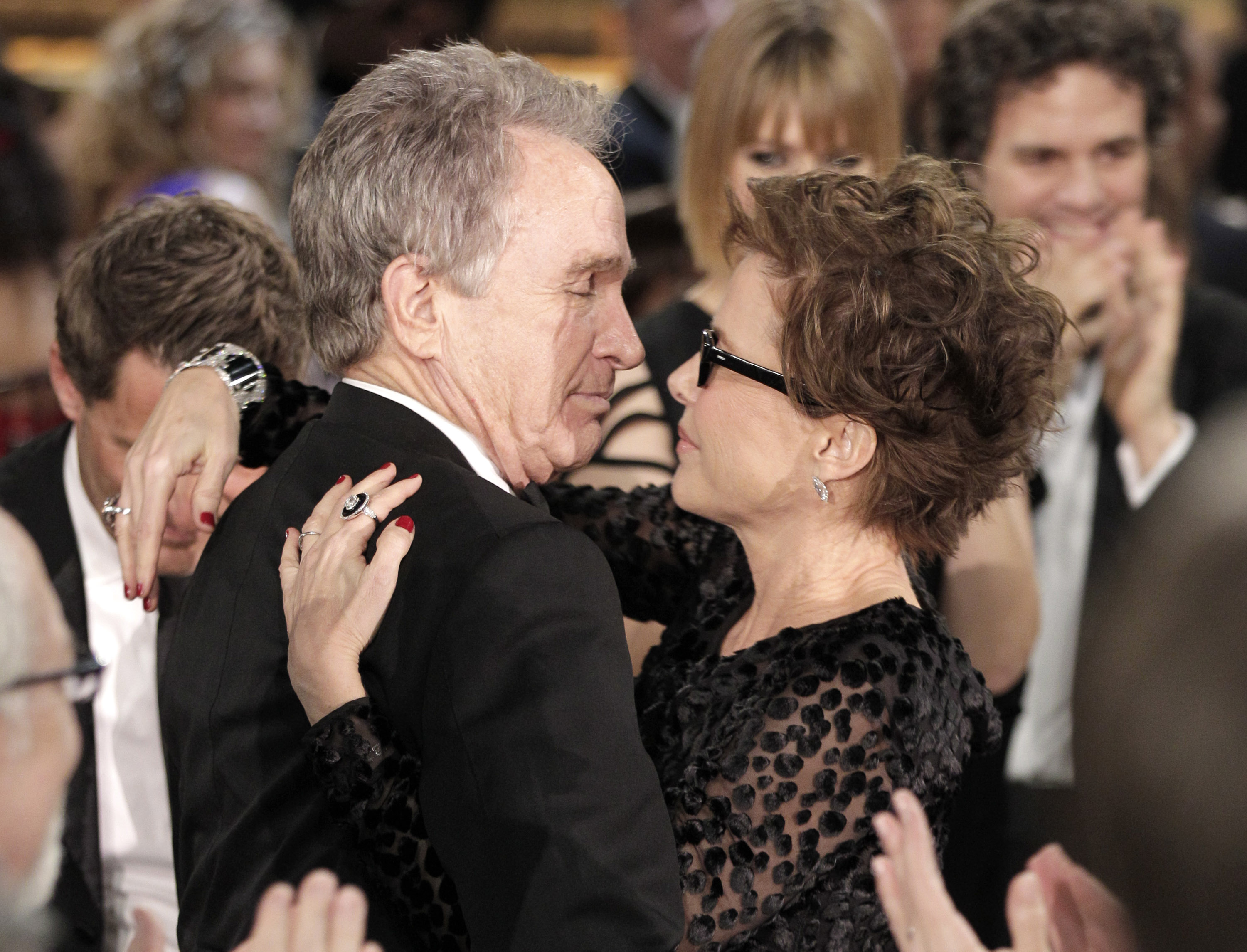 Warren Beatty and his wife Annette Bening during the 68th Annual Golden Globe Awards at the Beverly Hilton Hotel on January 16, 2011 | Source: Getty Images