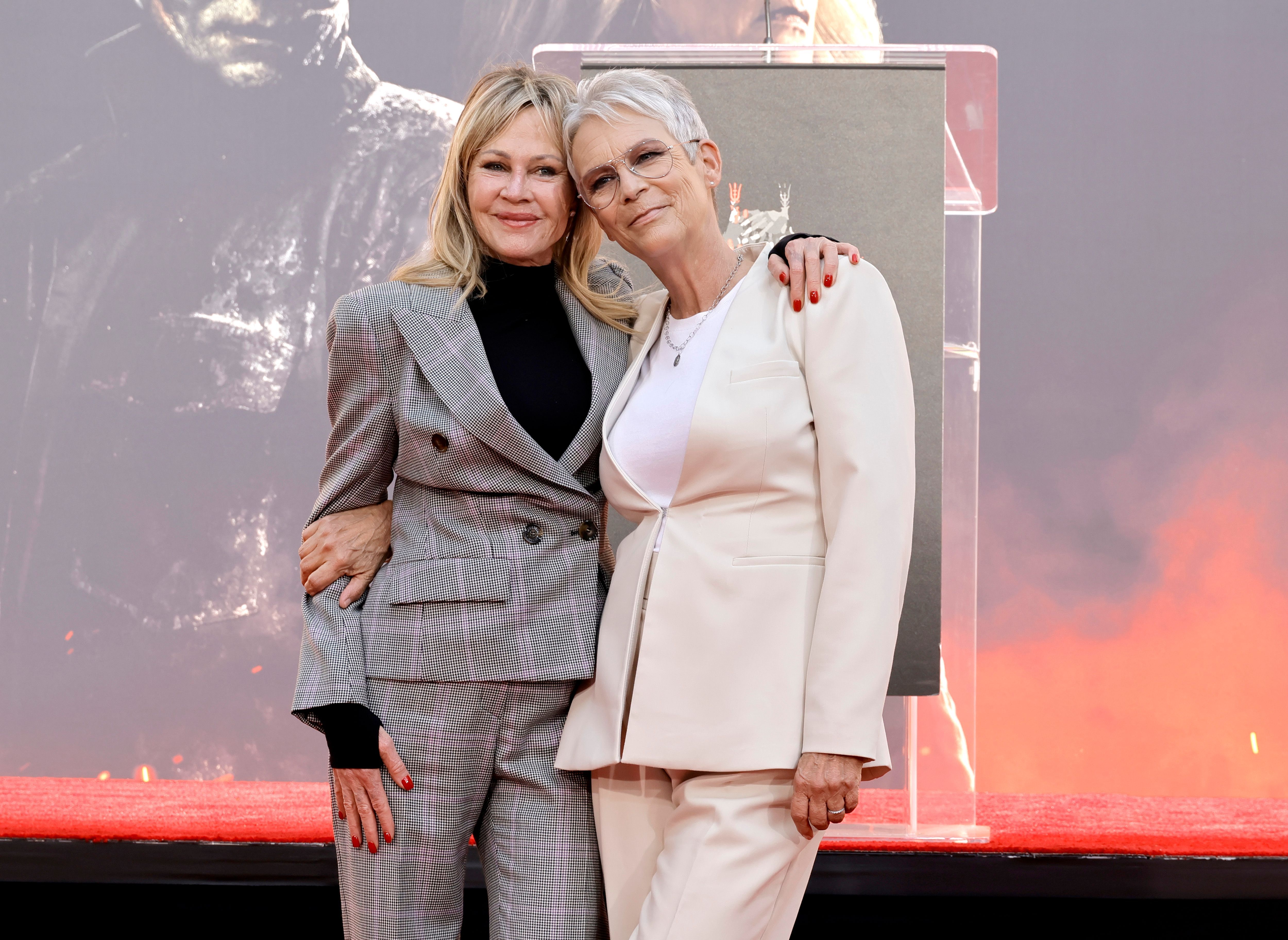 Melanie Griffith and Jamie Lee Curtis at the latter's Hand and Footprint In Cement Ceremony at TCL Chinese Theatre in Hollywood, California, on October 12, 2022. | Source: Getty Images